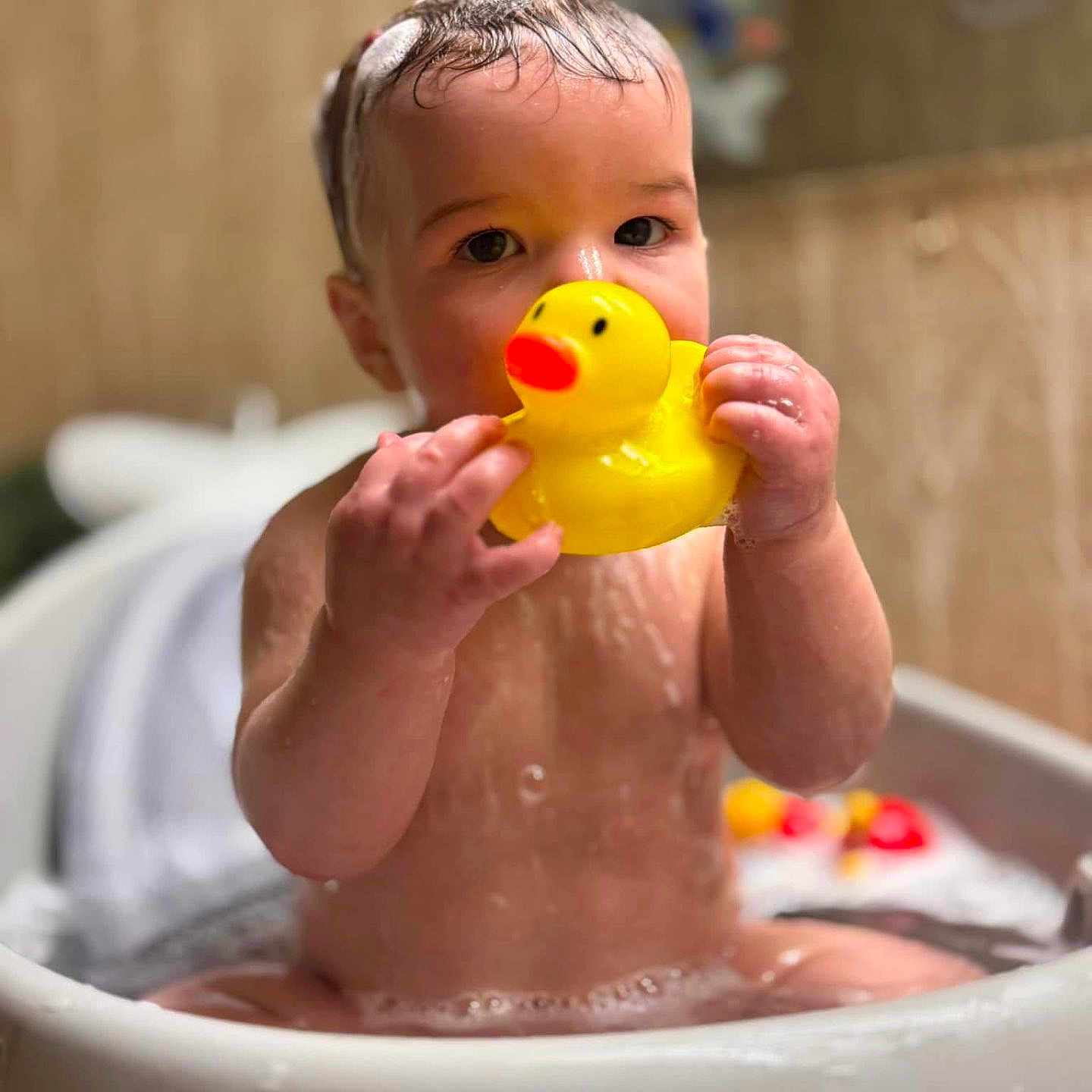 Ezra joined the competition — help win amazing prizes! baby, basin, bathing, bathtub, biting, eating, face, food, head, person, tub