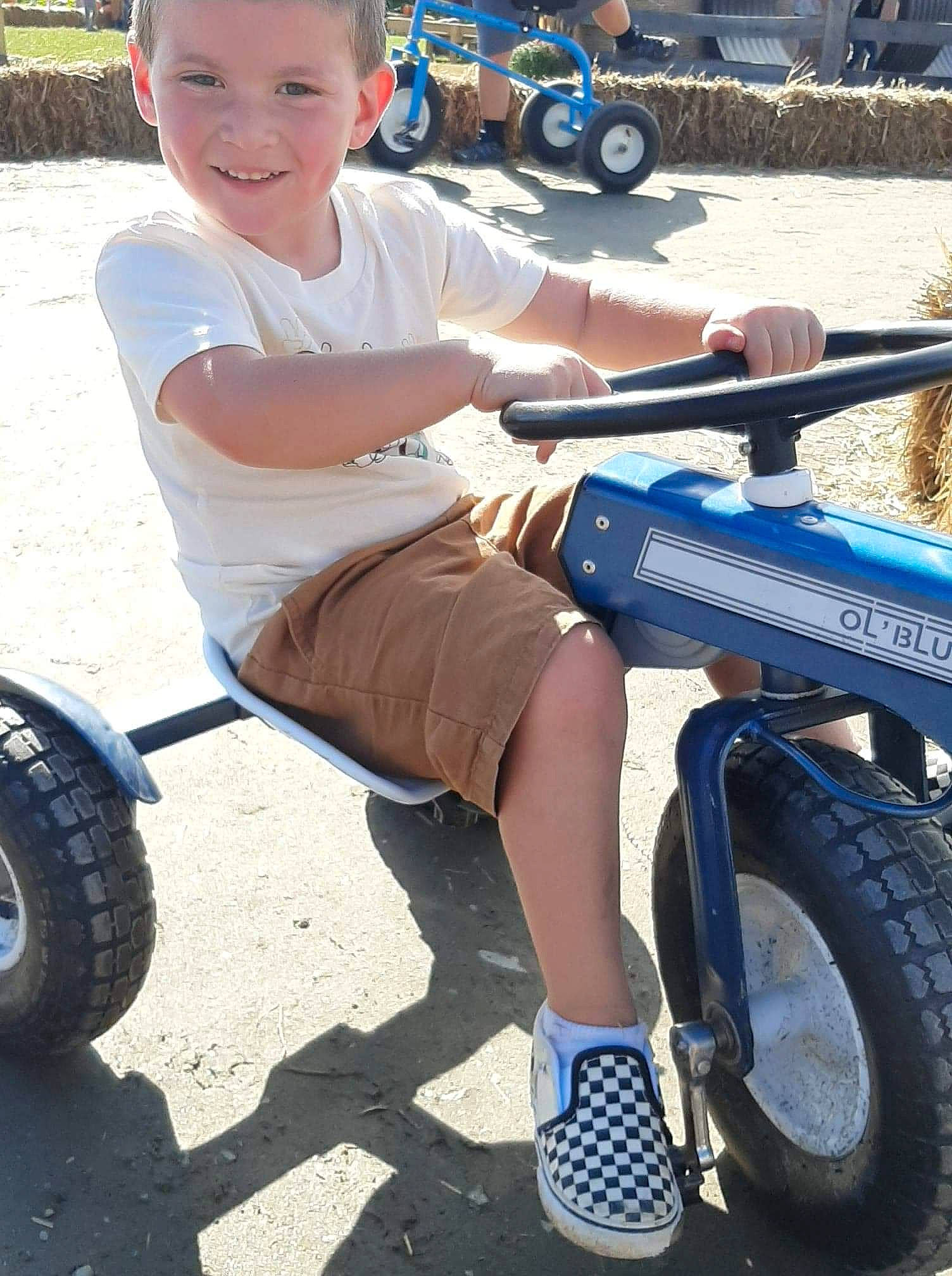 Josiah is registered to the contest to win money with this photo: automotive_design, automotive_tire, automotive_wheel_system, bicycle_tire, blue, fender, joy, leg, light, mode_of_transport, motor_vehicle, person, photograph, product, rim, shorts, smile, thigh, tire, tread