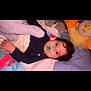 Malek a rejoint le concours — aidez-le/la à gagner de superbes lots ! baby, pacifier, curly_hair, stuffed_animals, blanket, bed, child, soft_toys, cute, indoor, portrait, lying_down, comfort, cozy, toddler, sleepwear, plush, face, resting, infant