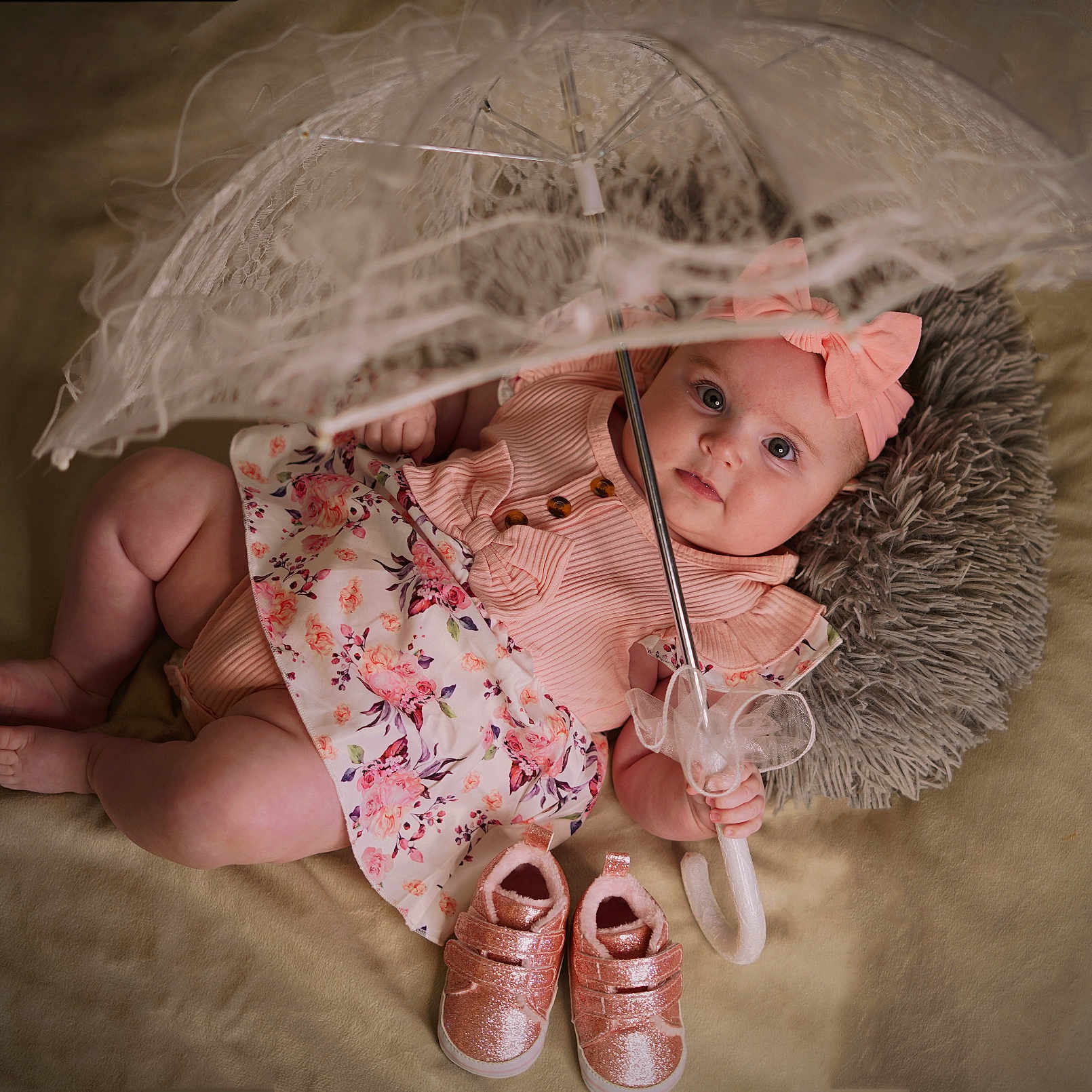 Rosie Elizabeth is registered to the contest to win money with this photo: baby, bodypart, bonnet, clothing, couch, dress, face, finger, footwear, furniture, hand, hat, head, person, photography, portrait, sandal, shoe, sneaker, toy