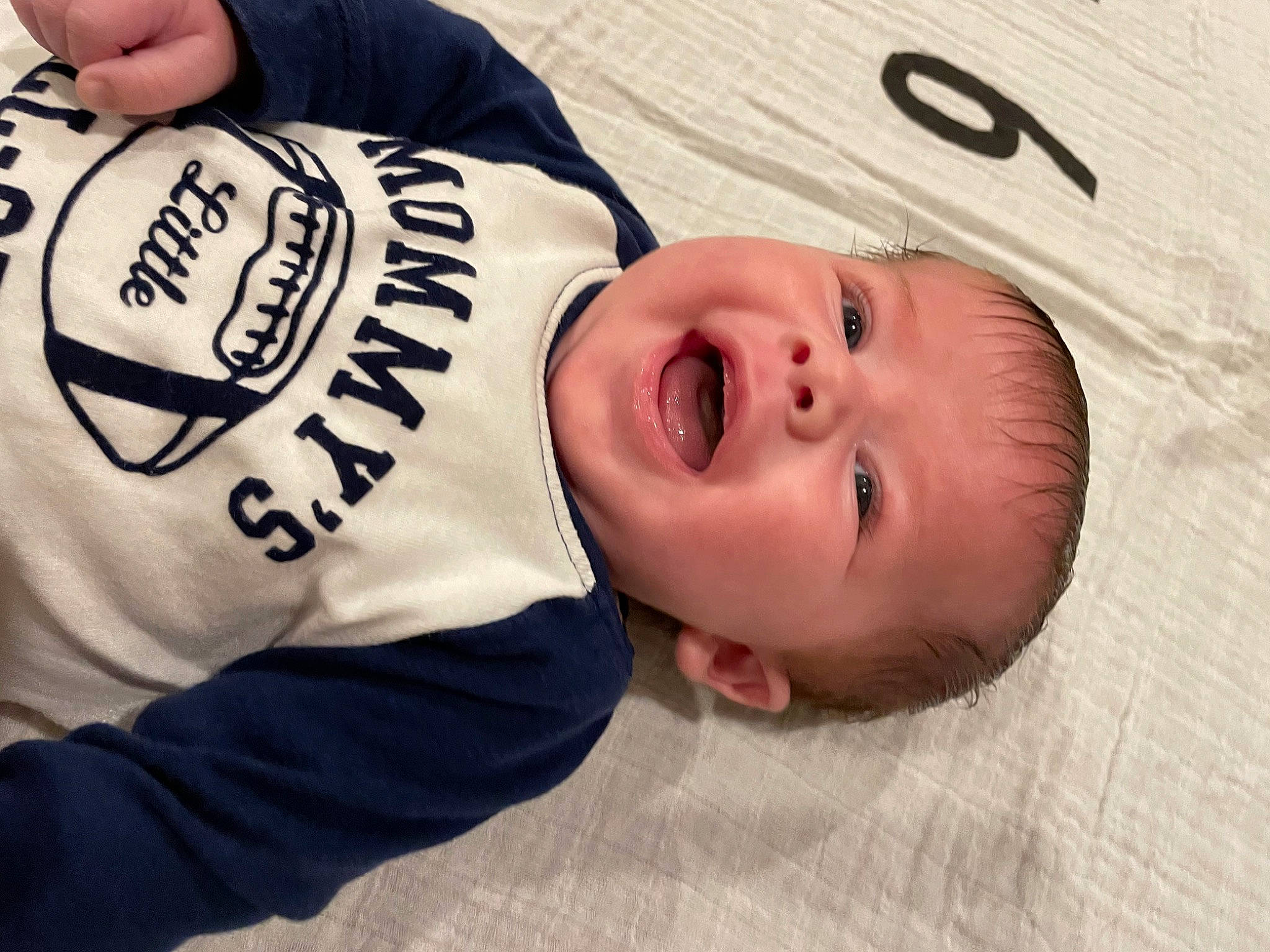 Dylan is registered to the contest to win money with this photo: baby, baby_laughing, baby_products, baby_toddler_clothing, cheek, child, comfort, elbow, eyelash, flooring, font, fun, happy, laugh, person, sleeve, smile, thumb, toddler, wood