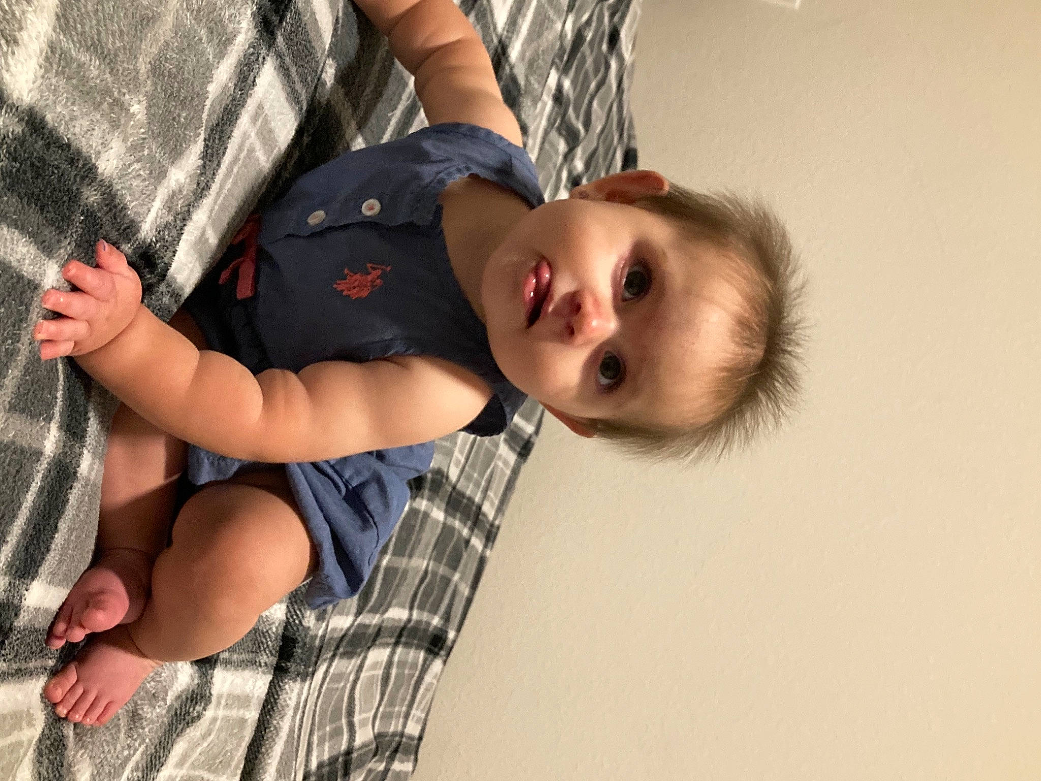 Heavenly is registered to the contest to win money with this photo: arm, baby, baby_toddler_clothing, child, comfort, elbow, eye, fun, gesture, happy, head, joint, pattern, person, plaid, sitting, sleeve, tartan, thigh, toddler