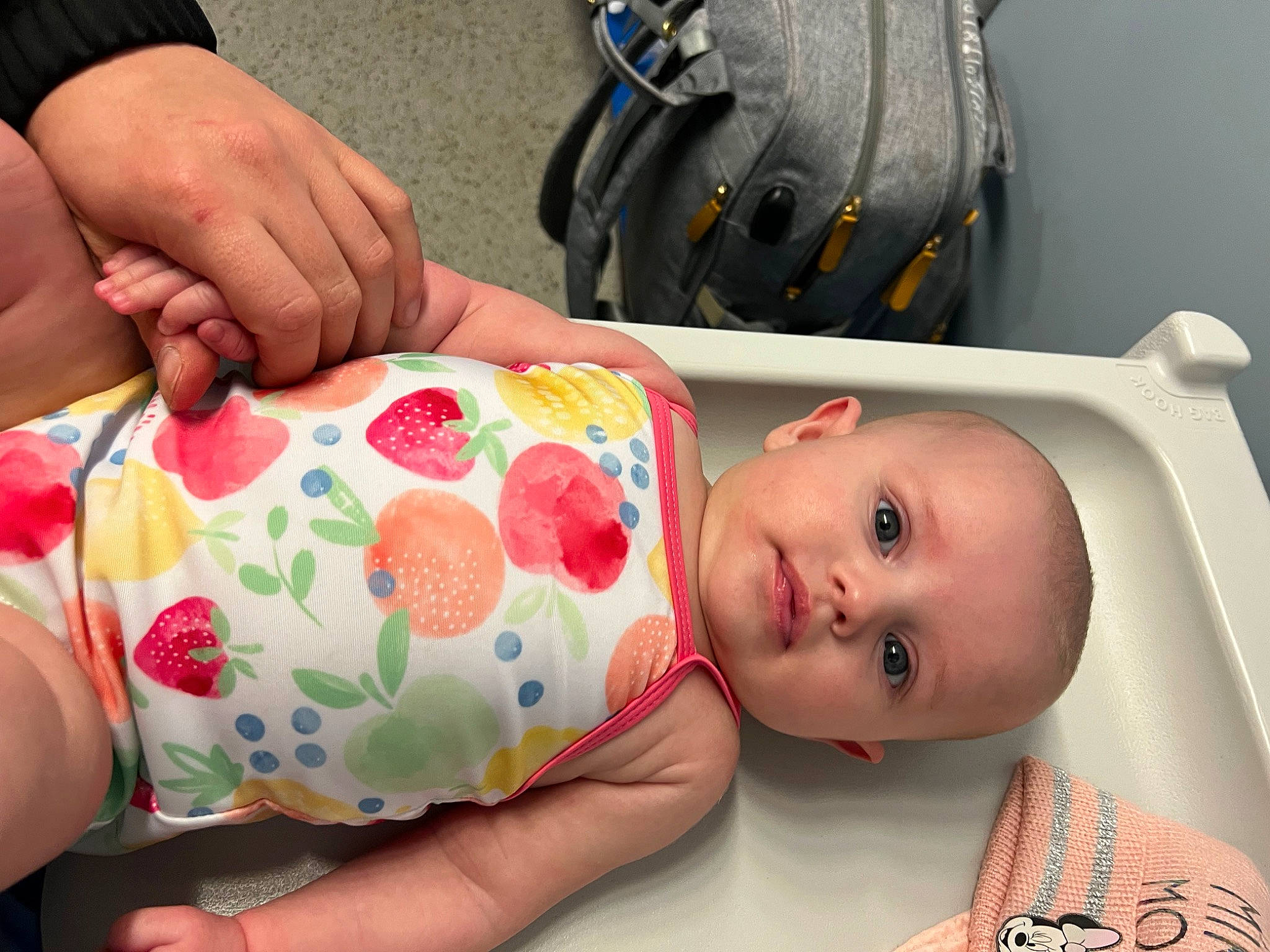 Emilia is registered to the contest to win money with this photo: abdomen, baby, baby_products, baby_toddler_clothing, cheek, chest, child, eyelash, face, finger, hand, human_body, luggage_and_bags, mouth, nail, person, personal_protective_equipment, skin, toddler, wrist