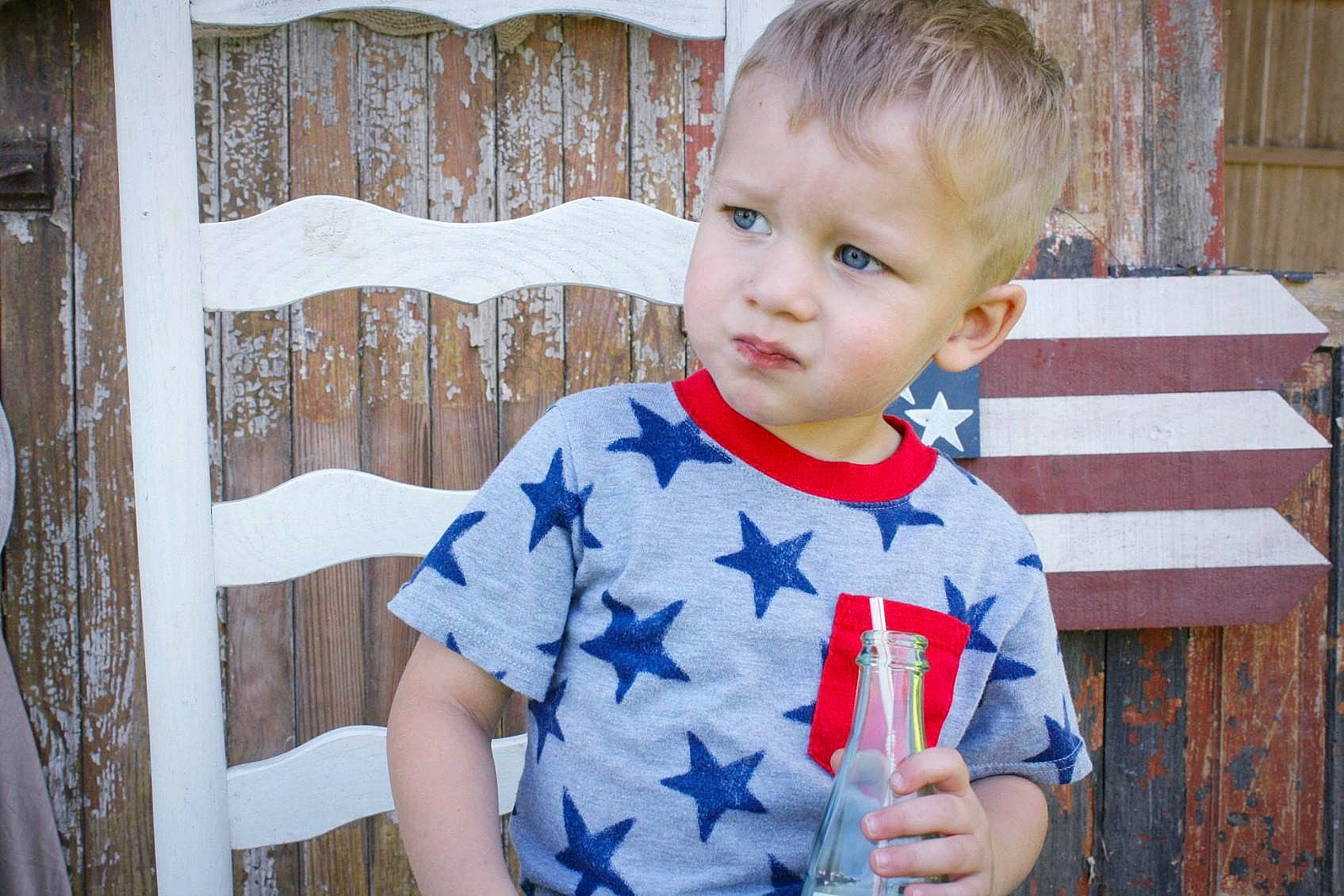 Tyeson is registered to the contest to win money with this photo: baby, baby_toddler_clothing, child, pattern, person, play, sleeve, smile, t_shirt, toddler