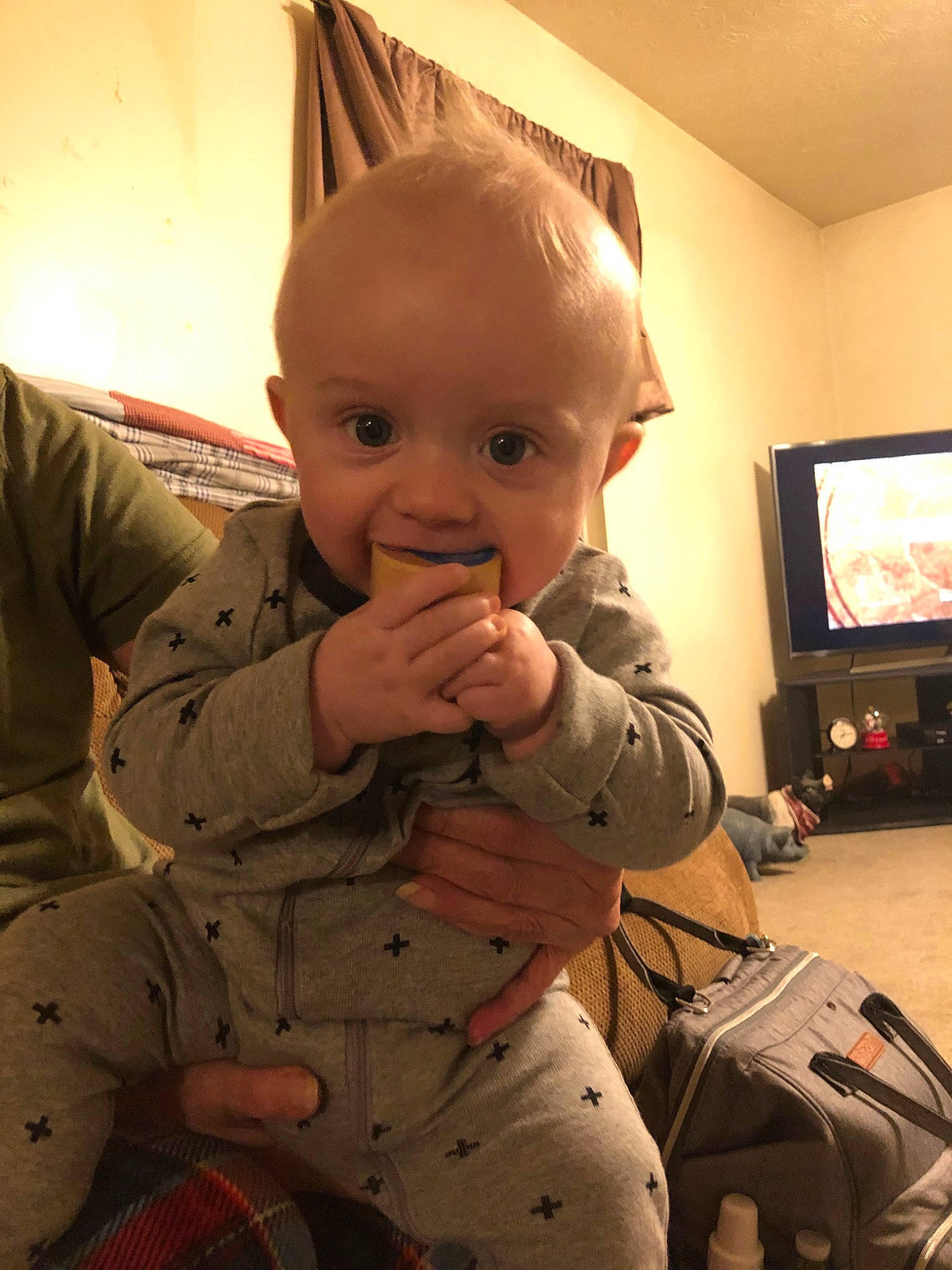 Hunter is registered to the contest to win money with this photo: baby, cheek, child, finger, forehead, joy, person, sleeve, thumb, toddler