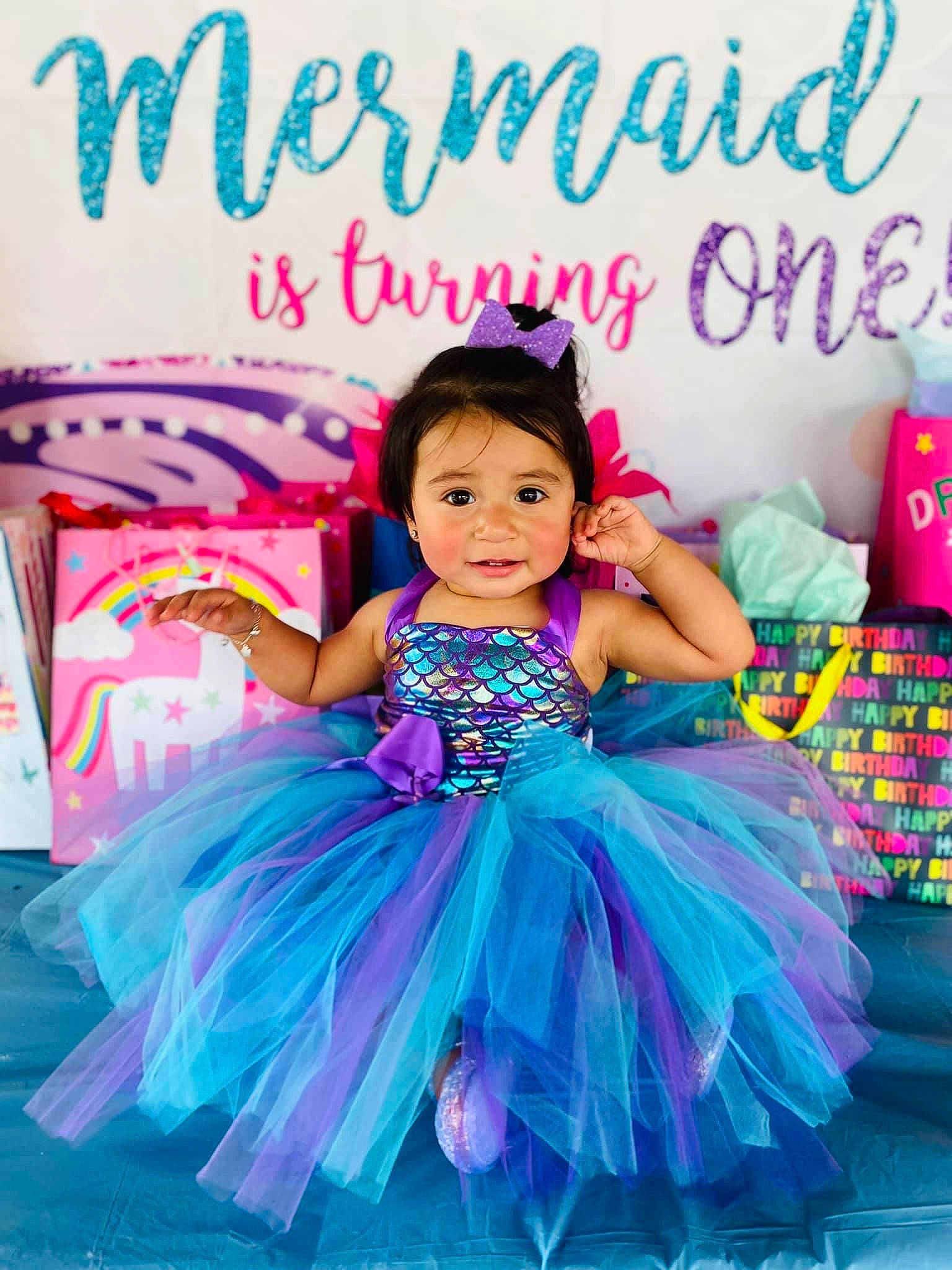 Ailani joined the competition — help win amazing prizes! baby_toddler_clothing, child, electric_blue, event, facial_expression, fashion_accessory, fashion_design, flash_photography, font, formal_wear, fun, hairstyle, happy, leisure, magenta, pattern, person, pink, ruffle, sitting