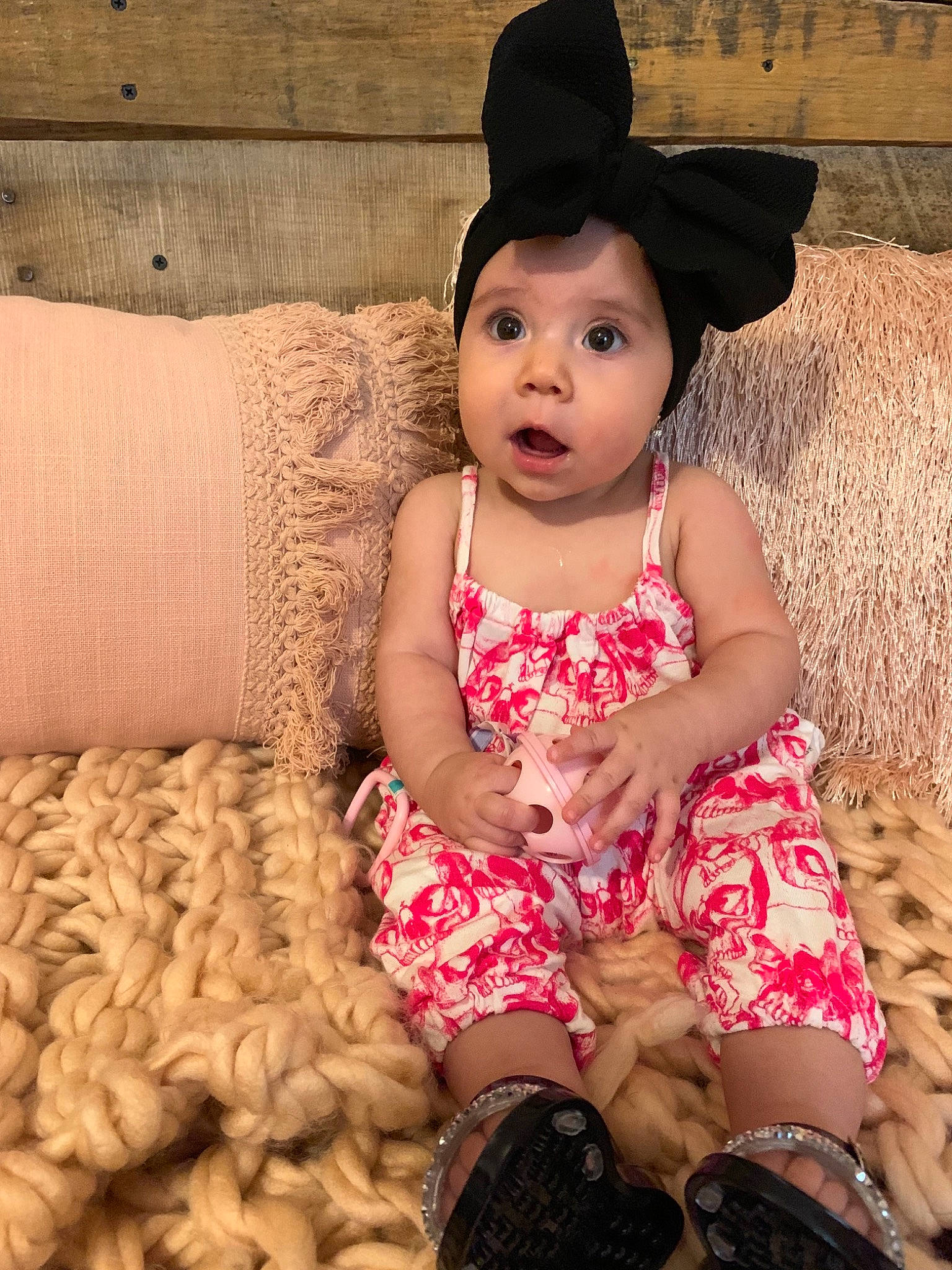 Jazalynn is registered to the contest to win money with this photo: baby, baby_toddler_clothing, beauty, cheek, child, child_model, clothing, dress, ear, eye, fashion_accessory, fawn, hat, headgear, pattern, person, pink, sitting, skin, smile