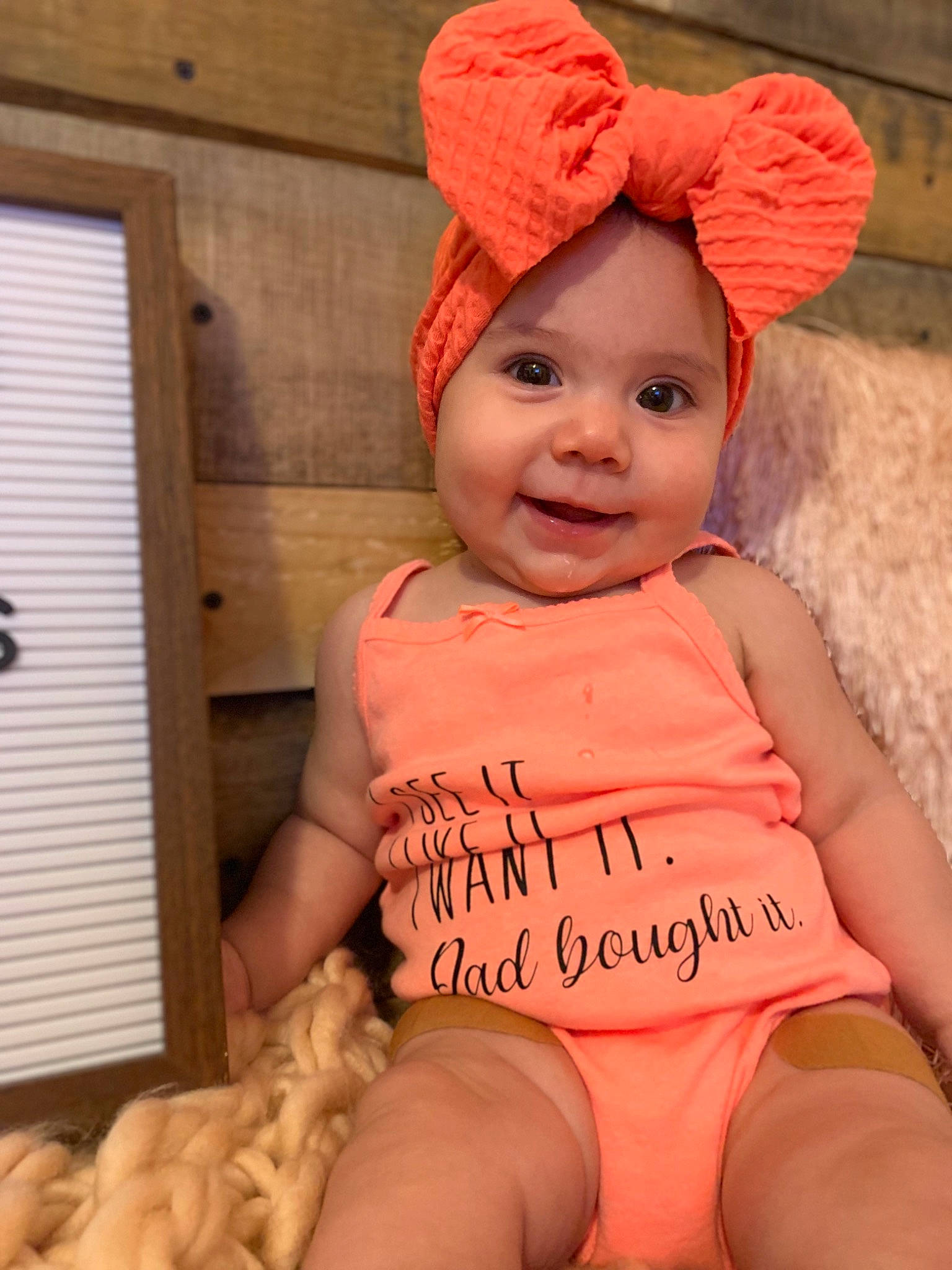 Jazalynn is registered to the contest to win money with this photo: baby, baby_toddler_clothing, beanie, cap, child, clothing, costume, costume_accessory, ear, headgear, knit_cap, orange, peach, person, pink, smile, toddler