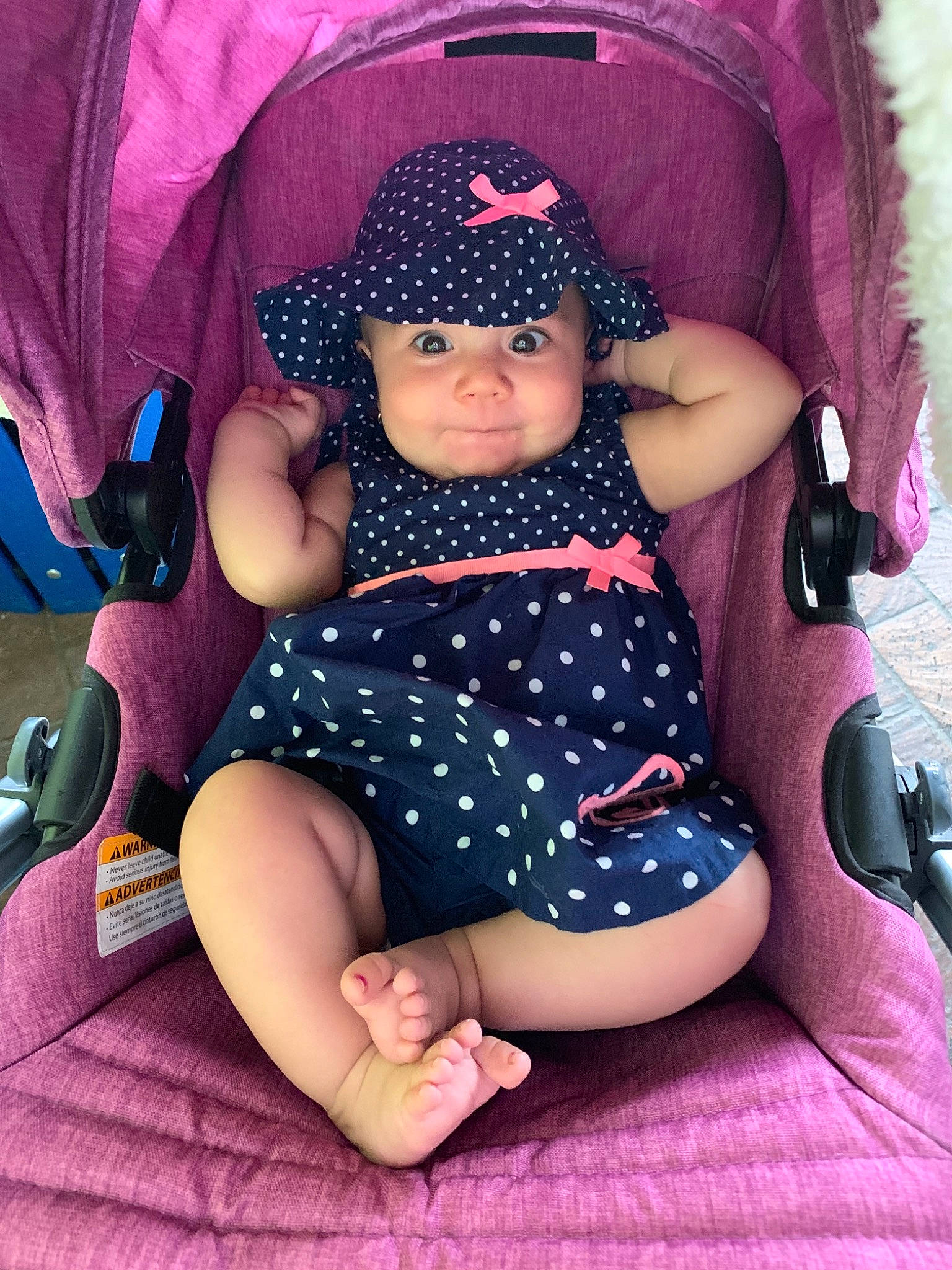 Jazalynn joined the competition — help win amazing prizes! baby, baby_carriage, baby_products, car_seat, child, design, hat, headgear, headwear, leg, magenta, pattern, person, pink, polka_dot, product, purple, sitting, skin, thigh