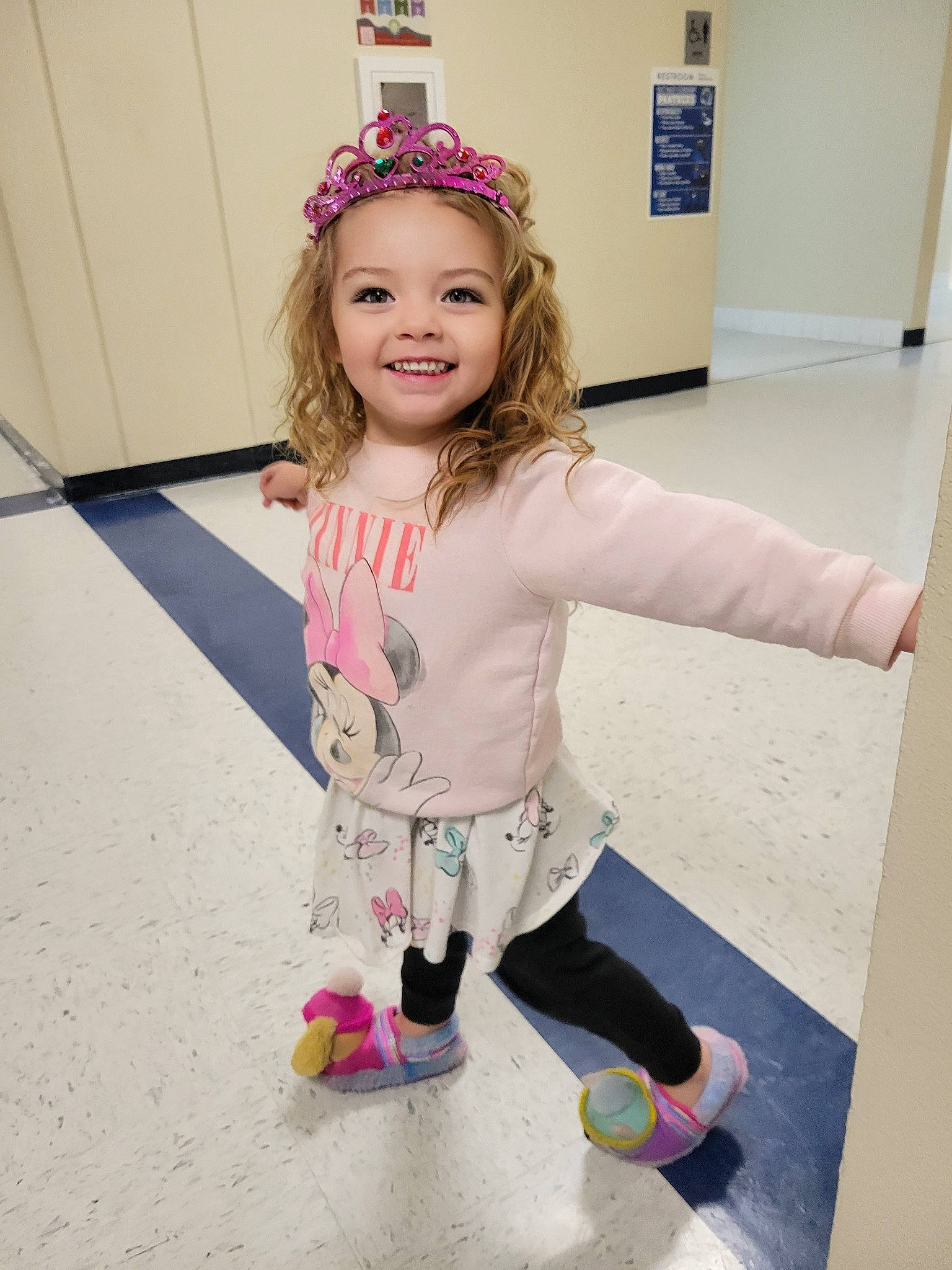 Echo is registered to the contest to win money with this photo: active_pants, baby_toddler_clothing, child, event, face, fashion_design, floor, flooring, fun, hair, happy, headgear, headwear, joy, person, pink, purple, sleeve, smile, sock