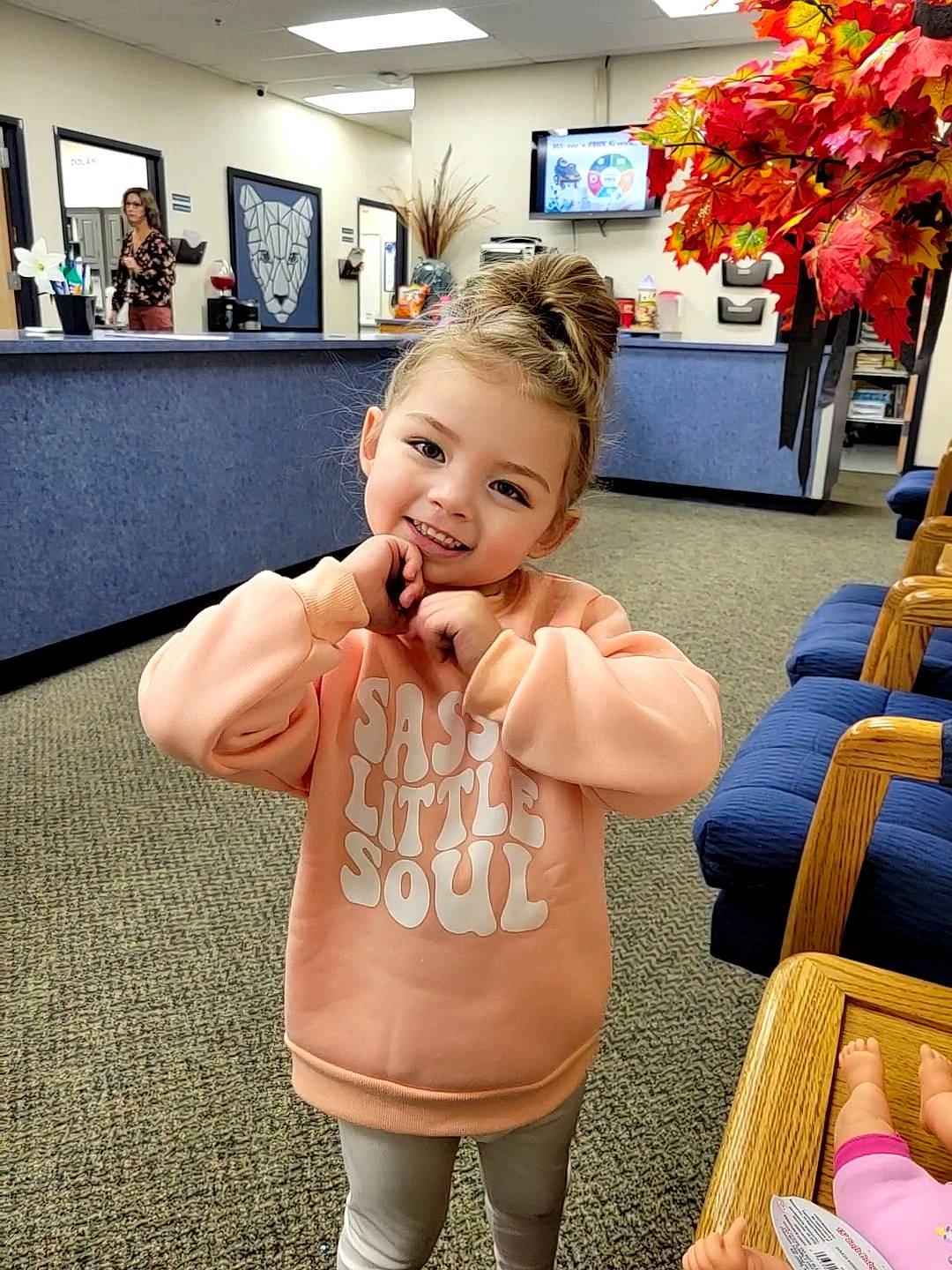 Echo is registered to the contest to win money with this photo: chair, child, event, flooring, flower, fun, hairstyle, happy, human_leg, joy, leisure, person, photograph, picture_frame, plant, room, smile, snapshot, sportswear, thigh