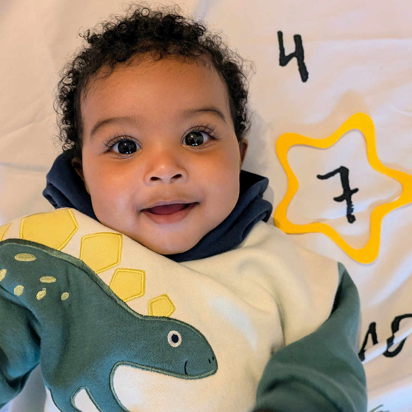 Josiah joined the competition — help win amazing prizes! applique, baby, bodypart, clothing, face, finger, hand, happy, head, hoodie, knitwear, longsleeve, pattern, person, photography, portrait, sleeve, smile, sweater, sweatshirt