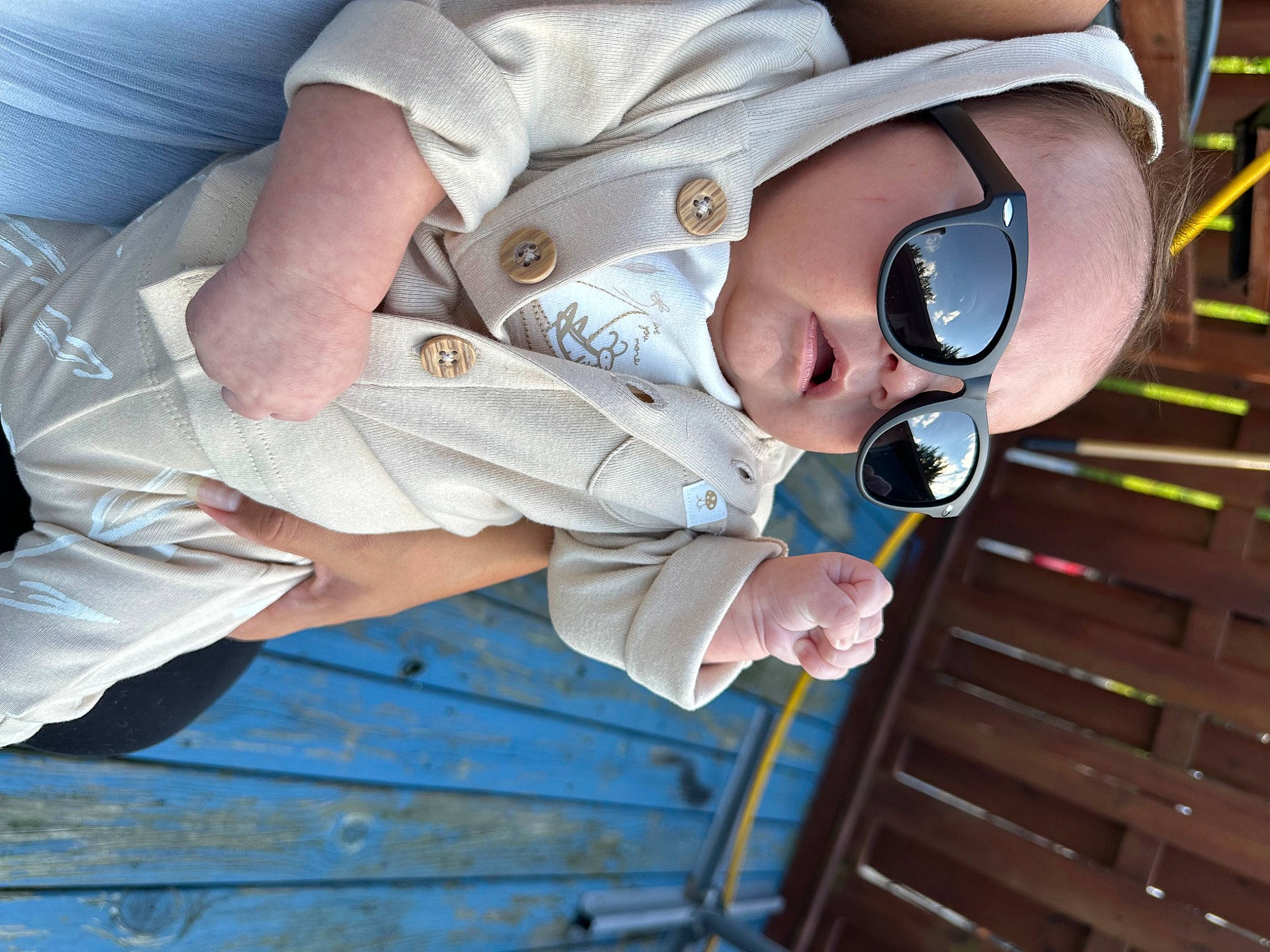 Damien is registered to the contest to win money with this photo: baby, baby_products, baby_toddler_clothing, blue, child, eyewear, fun, gesture, goggles, hat, helmet, pattern, person, personal_protective_equipment, plant, sleeve, sunglasses, toddler, tree, vision_care