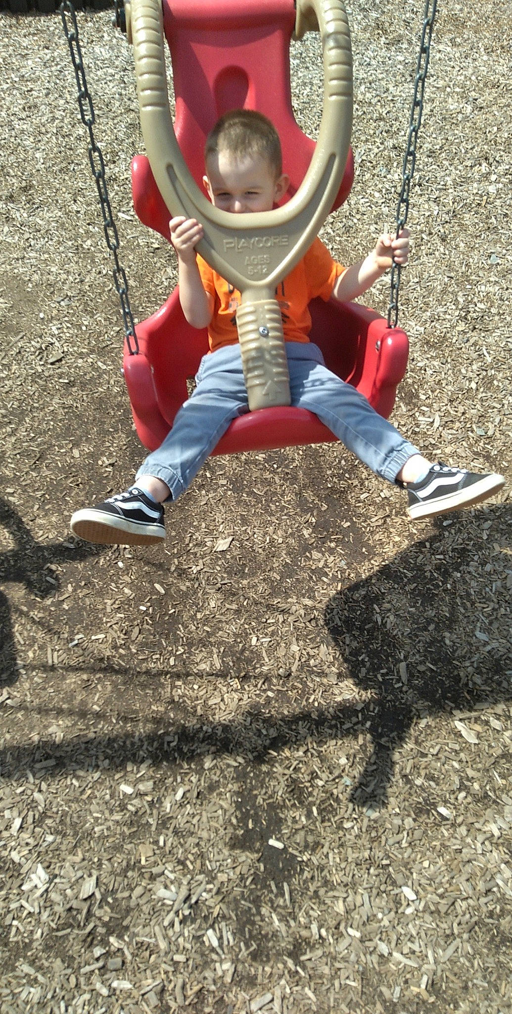 Clinton joined the competition — help win amazing prizes! baby_toddler_clothing, carmine, child, concrete, electric_blue, fun, grass, happy, leisure, outdoor_play_equipment, people_in_nature, person, play, playground, recreation, shadow, sitting, sleeve, sneakers, soil