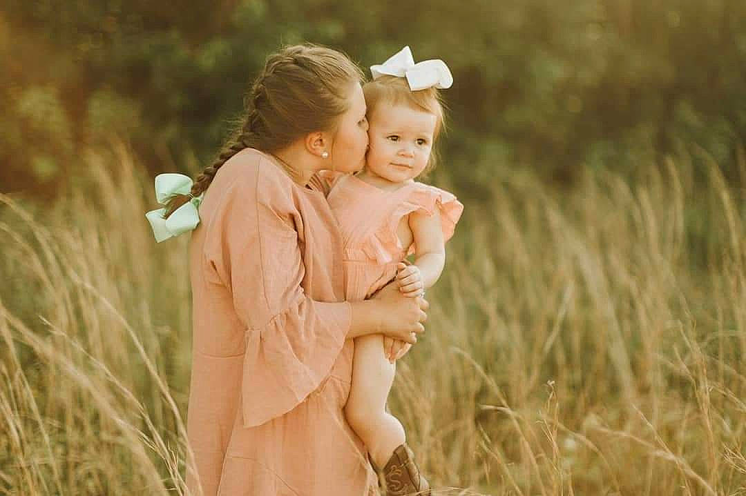 Mckinnley is registered to the contest to win money with this photo: child, fun, gesture, grass, grass_family, grassland, happy, love, meadow, people_in_nature, person, photograph, photography, plant, playing_with_kids, smile, toddler