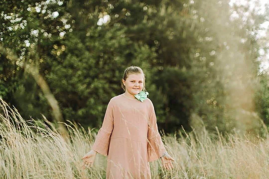 Mckinnley joined the competition — help win amazing prizes! beauty, blond, dress, fashion, grass, grass_family, joy, natural_environment, nature, outerwear, people_in_nature, person, photograph, photography, pink, portrait, portrait_photography, shoulder, spring, summer
