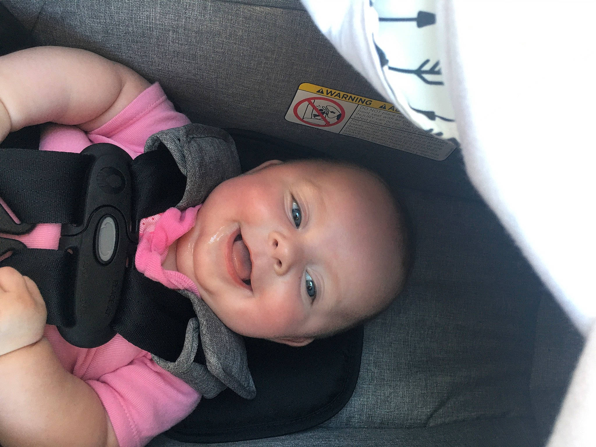 Aspen is registered to the contest to win money with this photo: arm, baby, baby_carriage, baby_products, car_seat, cheek, child, comfort, ear, finger, hand, head, person, pink, product, skin, thumb, toddler