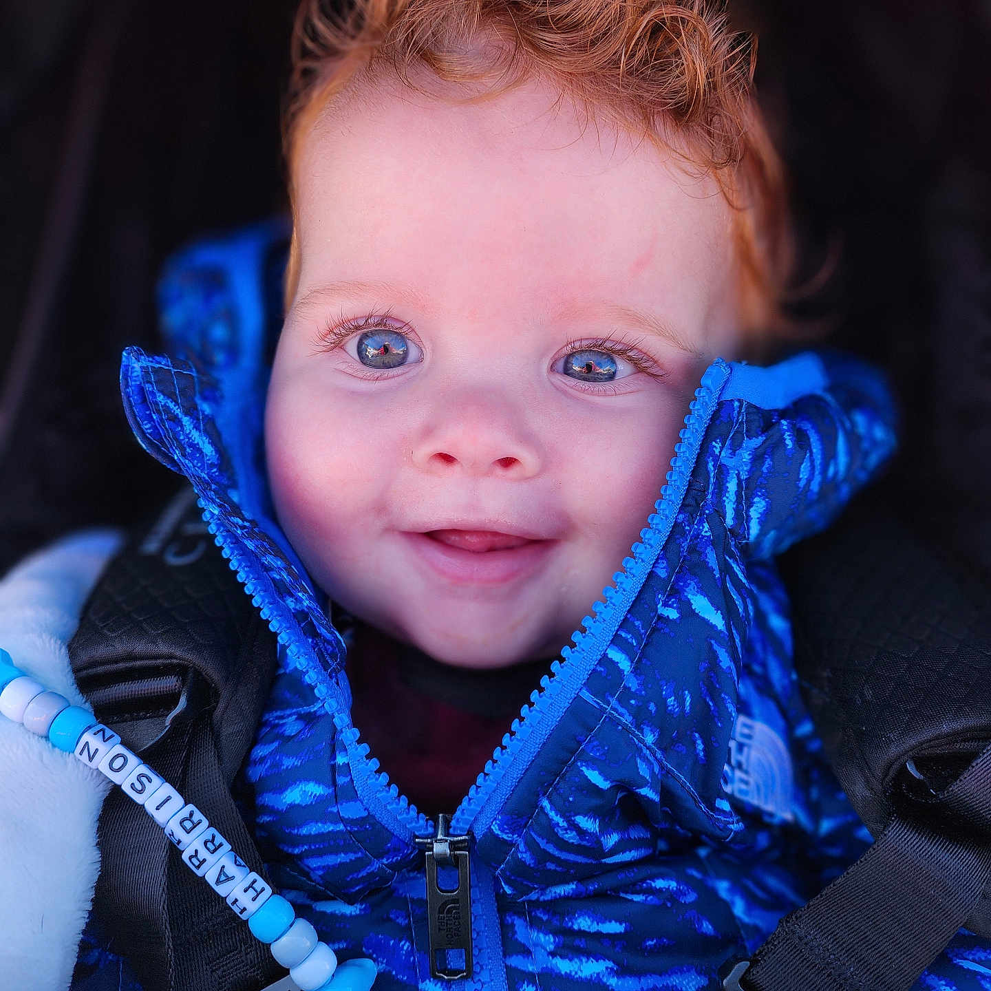 Harrison joined the competition — help win amazing prizes! baby, bodypart, clothing, coat, face, finger, hand, head, hood, hoodie, jacket, knitwear, lifejacket, pants, person, photography, portrait, sweater, sweatshirt, vest