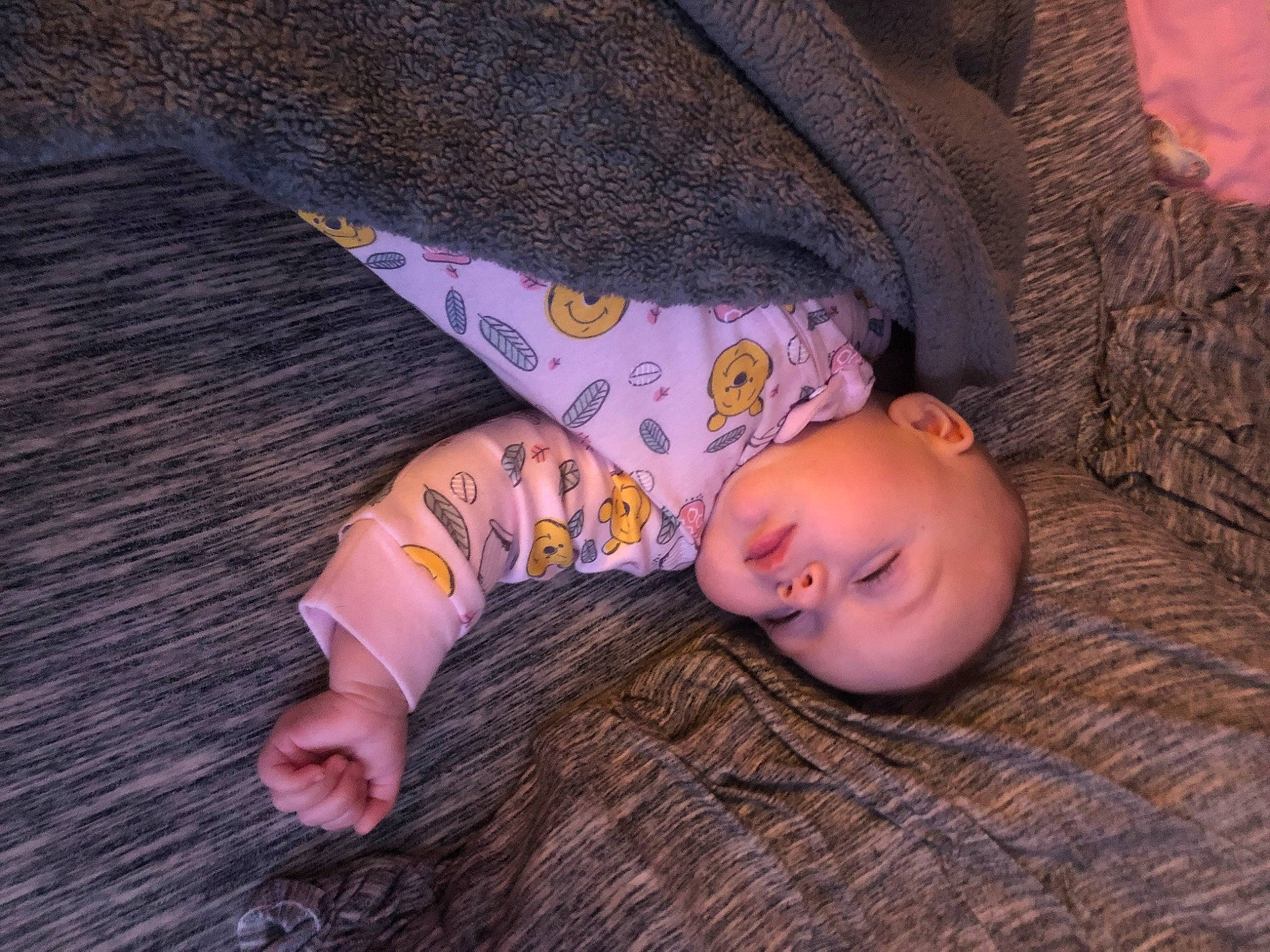 Anastyn Green is registered to the contest to win money with this photo: baby, baby_toddler_clothing, cheek, child, comfort, eye, finger, flash_photography, floor, flooring, grass, hardwood, head, nose, person, purple, skin, sleeve, textile, toddler