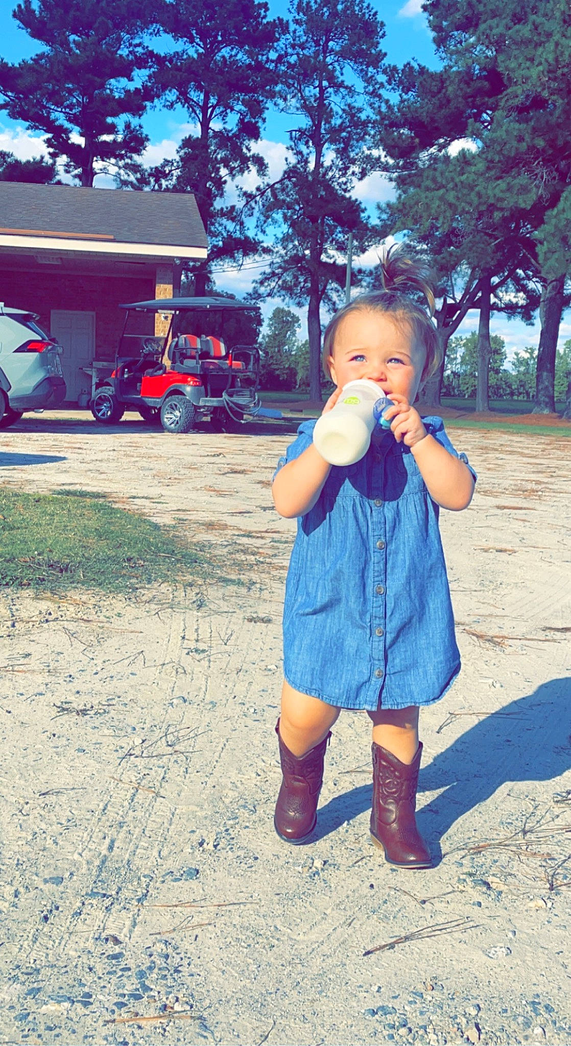 Sutton joined the competition — help win amazing prizes! child, denim, electric_blue, fun, grass, happy, leisure, motor_vehicle, pattern, people_in_nature, person, plant, play, shoe, soil, tints_and_shades, tire, toddler, tree, truck