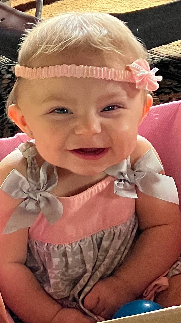 Kaydence is registered to the contest to win money with this photo: baby, baby_toddler_clothing, cheek, chin, dress, eye, eyelash, facial_expression, hair, happy, headgear, headwear, iris, lip, mouth, person, pink, skin, smile, summer