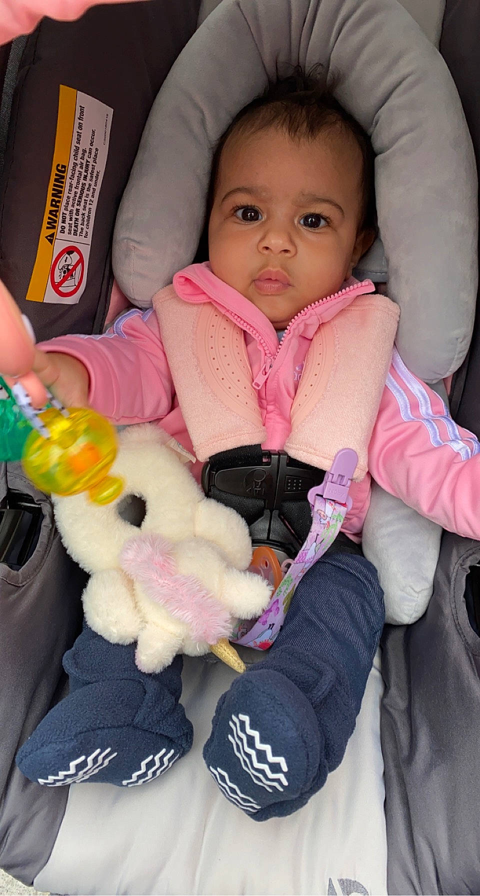 Jazlyn is registered to the contest to win money with this photo: baby, baby_products, baby_toddler_clothing, car_seat, cheek, comfort, face, finger, hand, nail, nose, person, pink, plastic_bottle, skin, sleeve, textile, thumb, toddler, toy