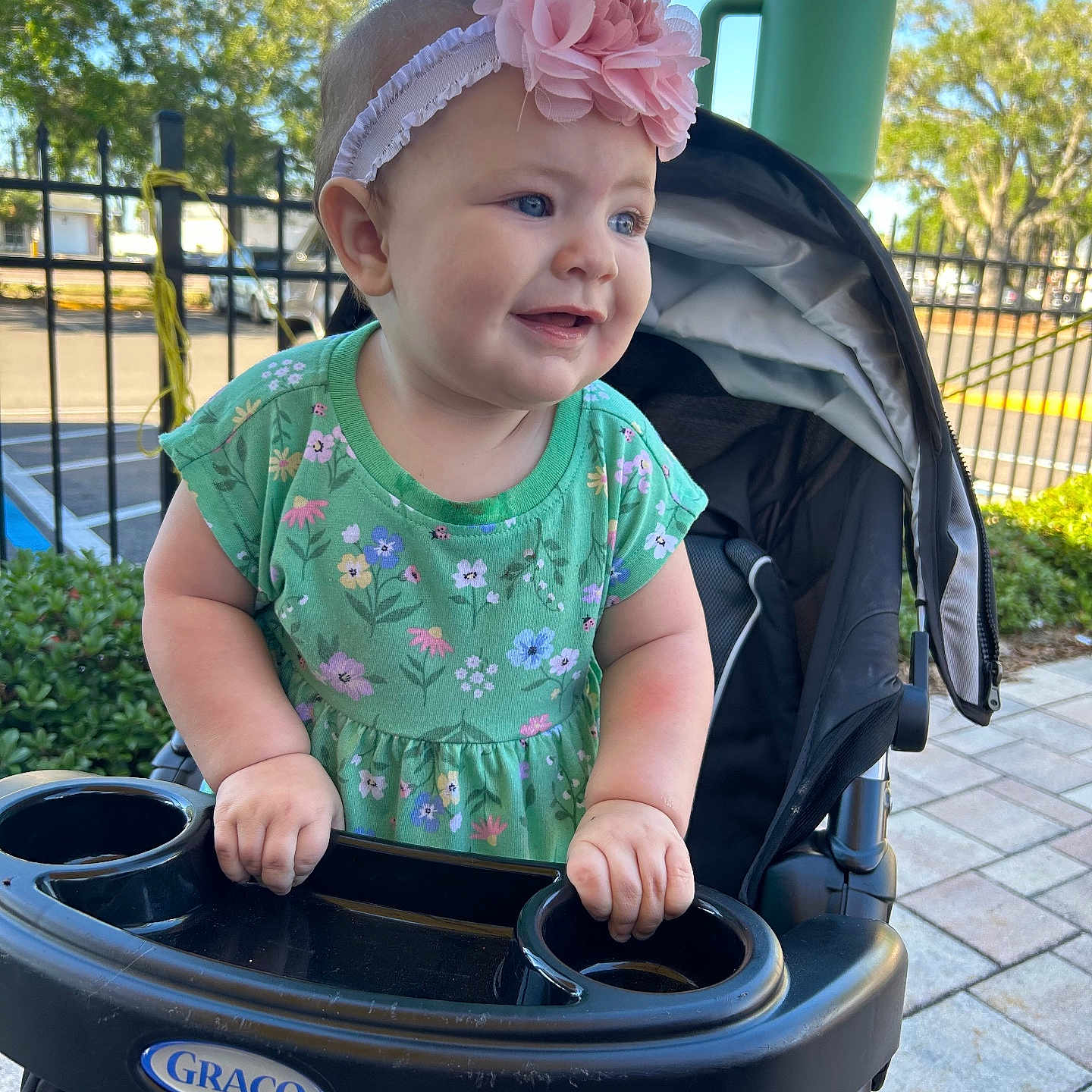 Haisley joined the competition — help win amazing prizes! baby, cap, car, clothing, face, footwear, grass, hat, head, nature, outdoors, park, person, photography, plant, portrait, shoe, stroller, summer, transportation
