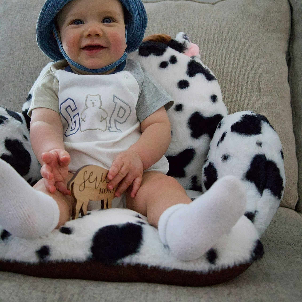 Indie joined the competition — help win amazing prizes! architecture, baby, building, cap, clothing, couch, cushion, face, furniture, hat, head, homedecor, hosiery, indoors, pants, person, photography, portrait, sitting, sock