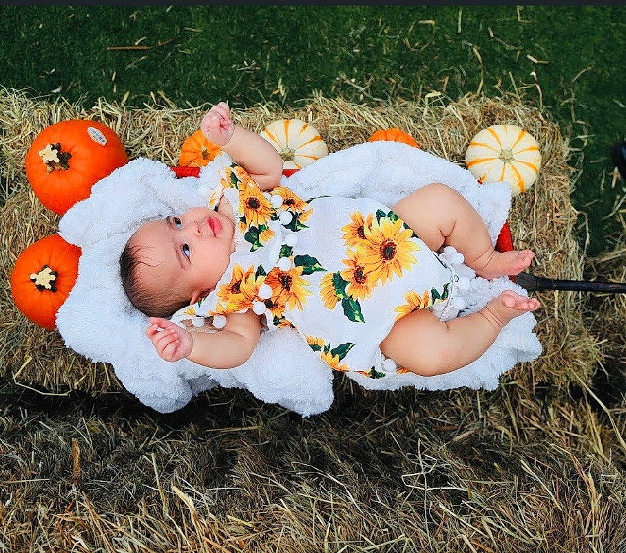 Aubri is registered to the contest to win money with this photo: baby, child, grass, person, toddler