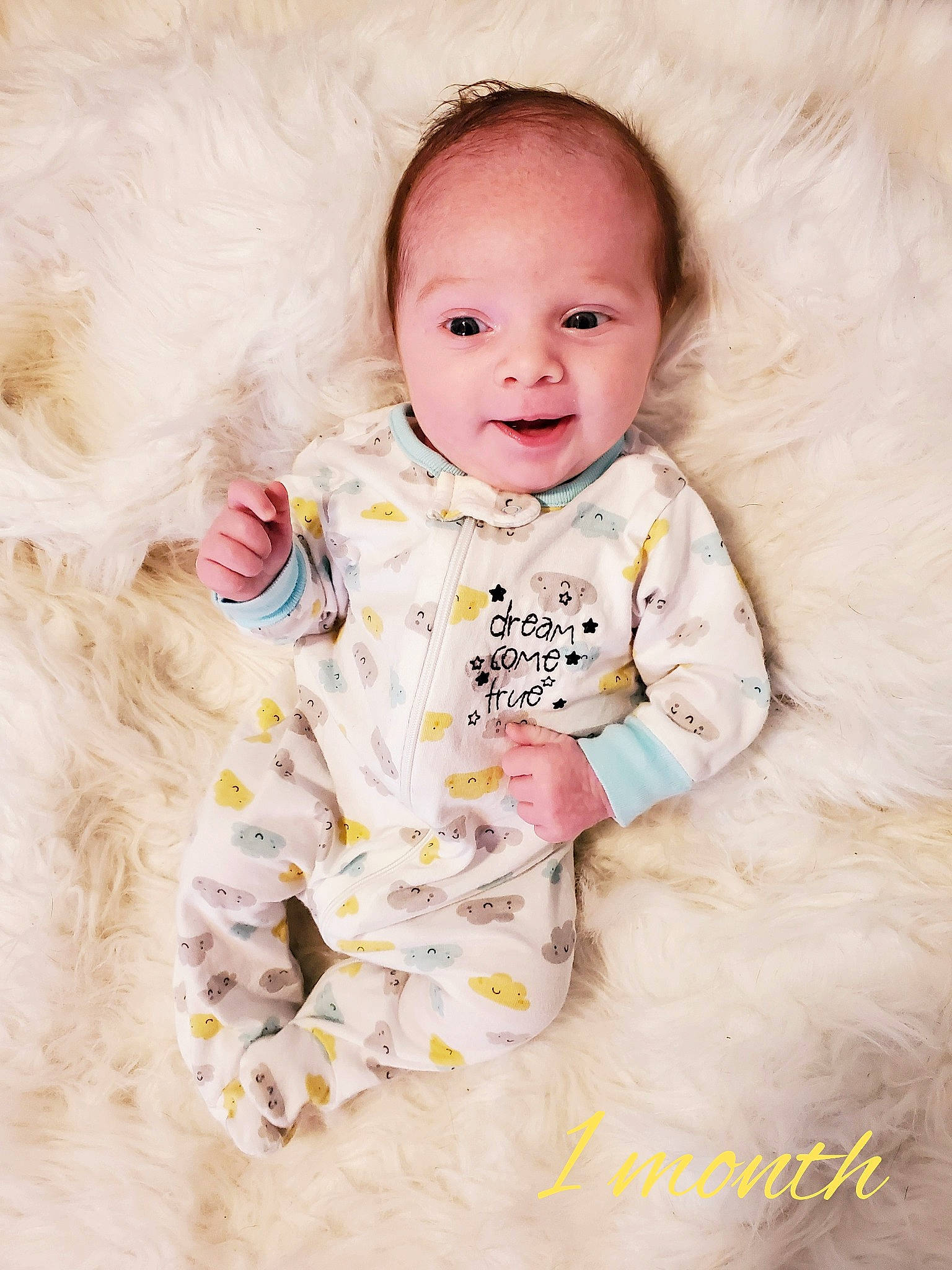 Braylon joined the competition — help win amazing prizes! baby, baby_toddler_clothing, child, comfort, face, happy, linens, pattern, person, pink, portrait_photography, product, sitting, skin, sleeve, smile, toddler