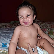 Raymason joined the competition — help win amazing prizes! baby, child, smiling, diaper, bed, blanket, hand, indoor, happy, cute, topknot, person, skin, toddler, infant, playful, human, furniture, comfort, portrait