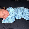 Kylo joined the competition — help win amazing prizes! baby, sleeping, infant, blue_onesie, striped_clothing, pacifier, blanket, cozy, resting, peaceful, child, cute, newborn, soft_lighting, indoors, portrait, relaxing, hands_together, face, lying_down