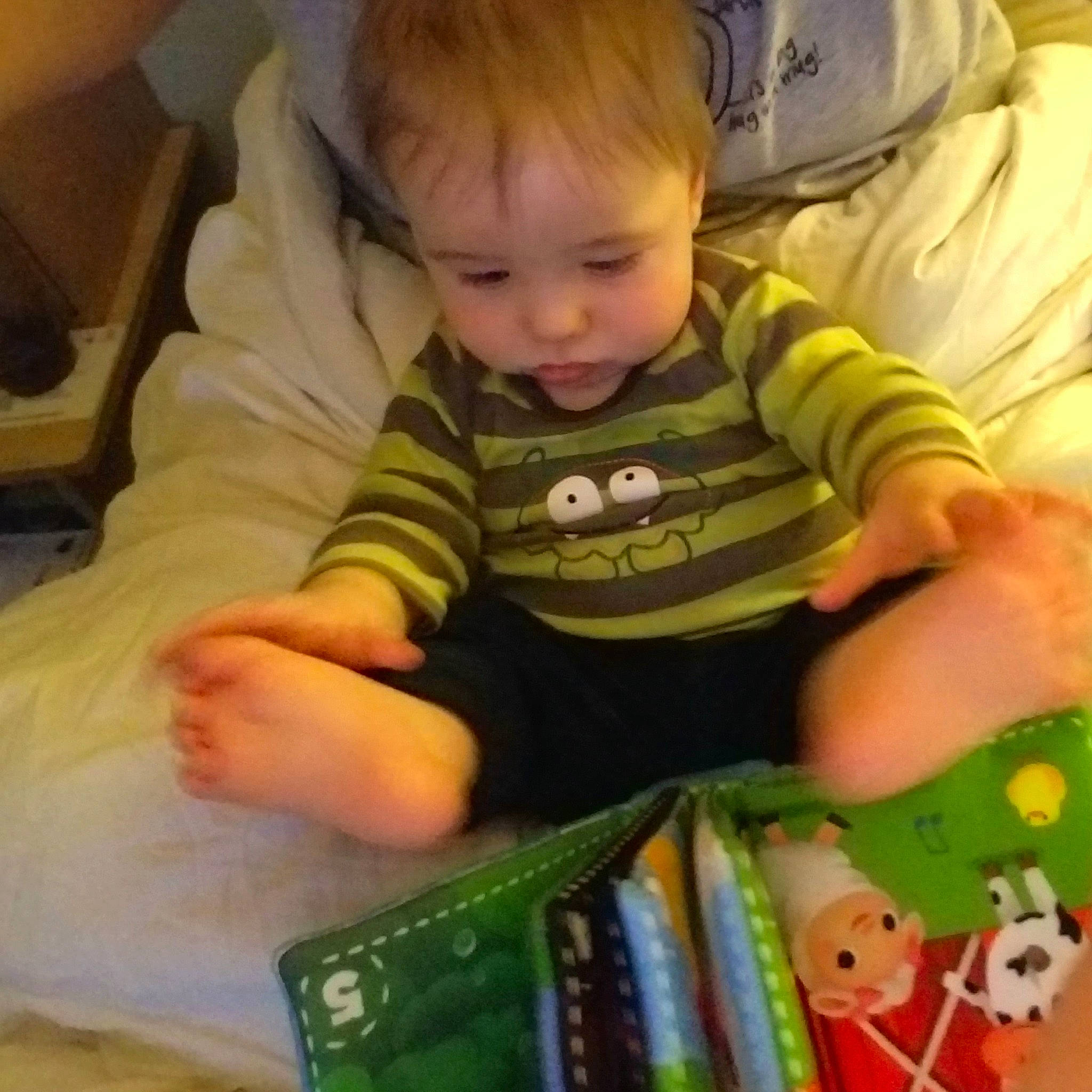 Liam joined the competition — help win amazing prizes! baby, bedtime, cheek, child, person, play, reading, sitting, toddler, toy, tummy_time