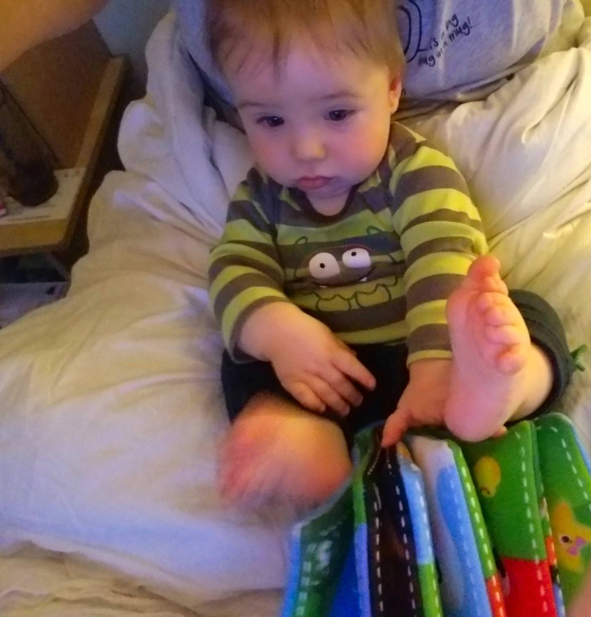 Liam is registered to the contest to win money with this photo: arm, baby, baby_products, cheek, child, cool, ear, eye, finger, hand, nose, person, play, product, sitting, skin, smile, toddler, tummy_time