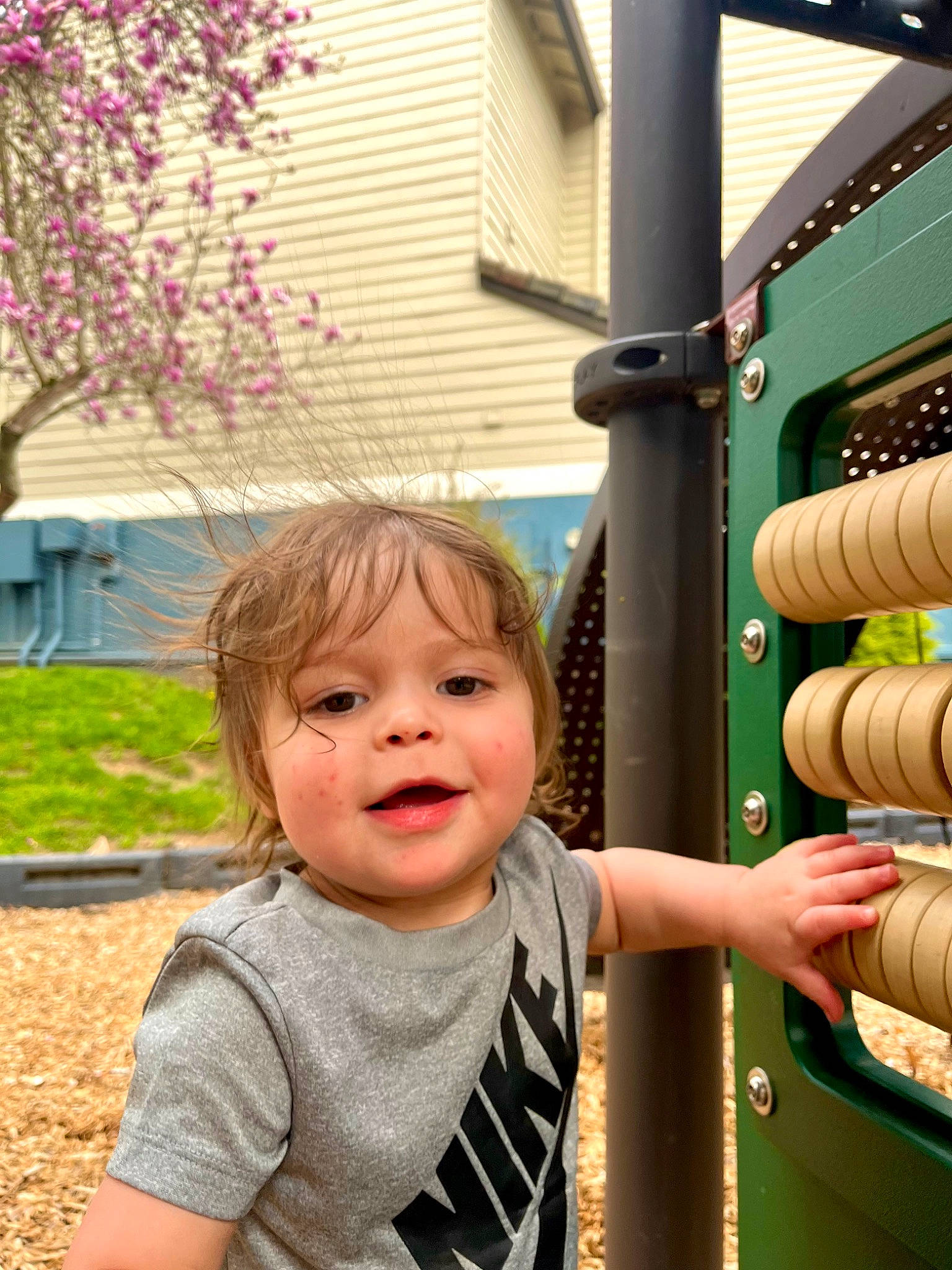 Kaimani joined the competition — help win amazing prizes! baby, baby_toddler_clothing, child, city, eye, facial_expression, fun, grass, happy, human, leisure, person, plant, play, recreation, smile, standing, t_shirt, toddler, tree