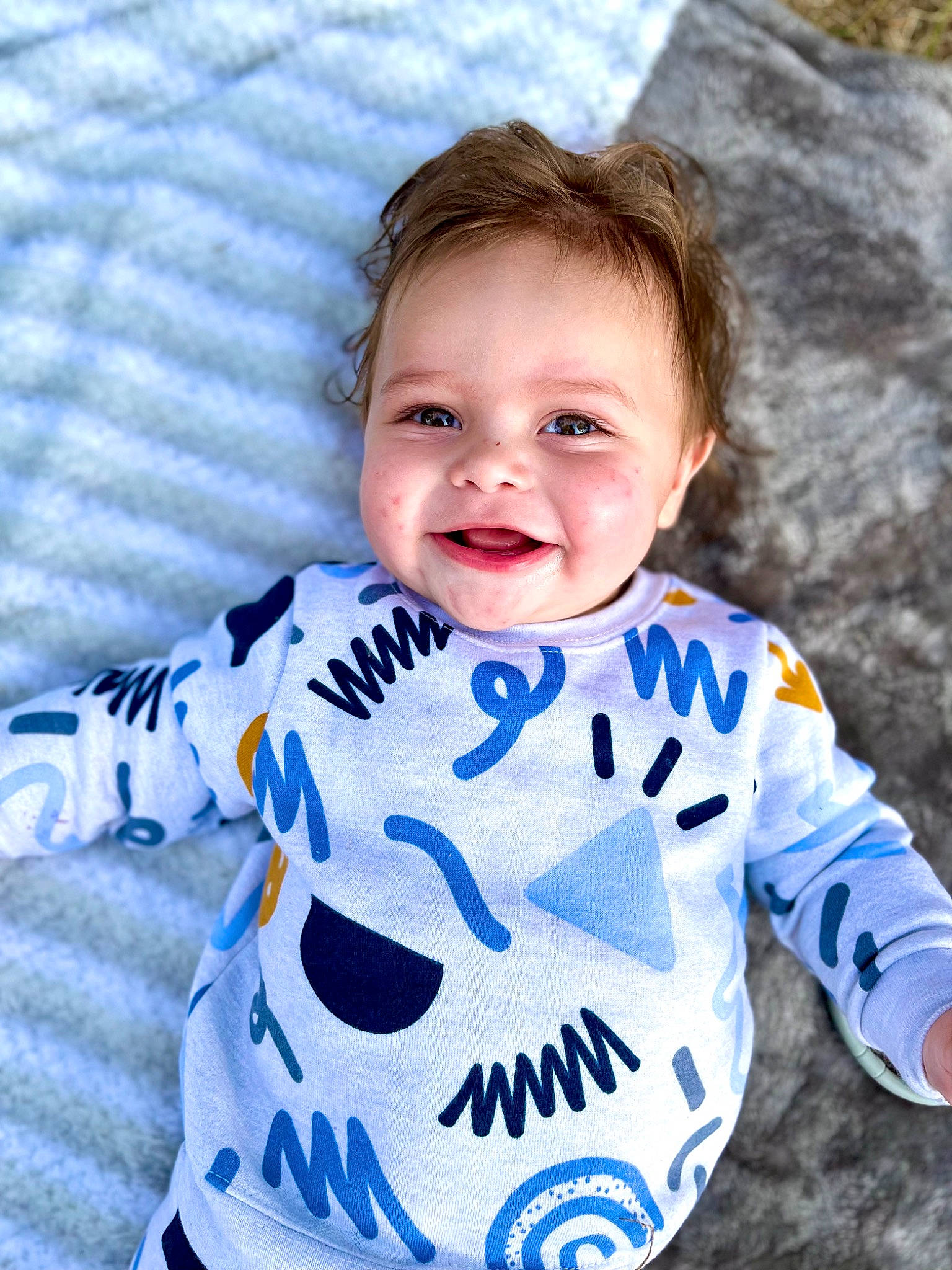 Kaimani is registered to the contest to win money with this photo: arm, baby_toddler_clothing, cheek, child, chin, cool, electric_blue, eye, face, facial_expression, hairstyle, happy, head, joy, mammal, organ, person, sleeve, smile, t_shirt