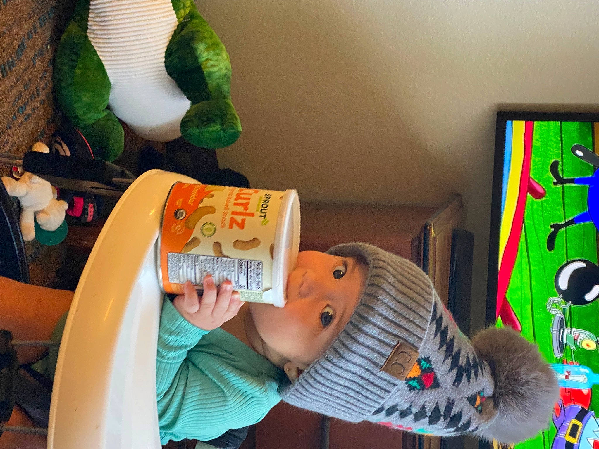 Sebastian joined the competition — help win amazing prizes! art, baby, child, green, hat, headgear, headwear, person, product, room, shelf, shelving, textile, toddler, visual_arts