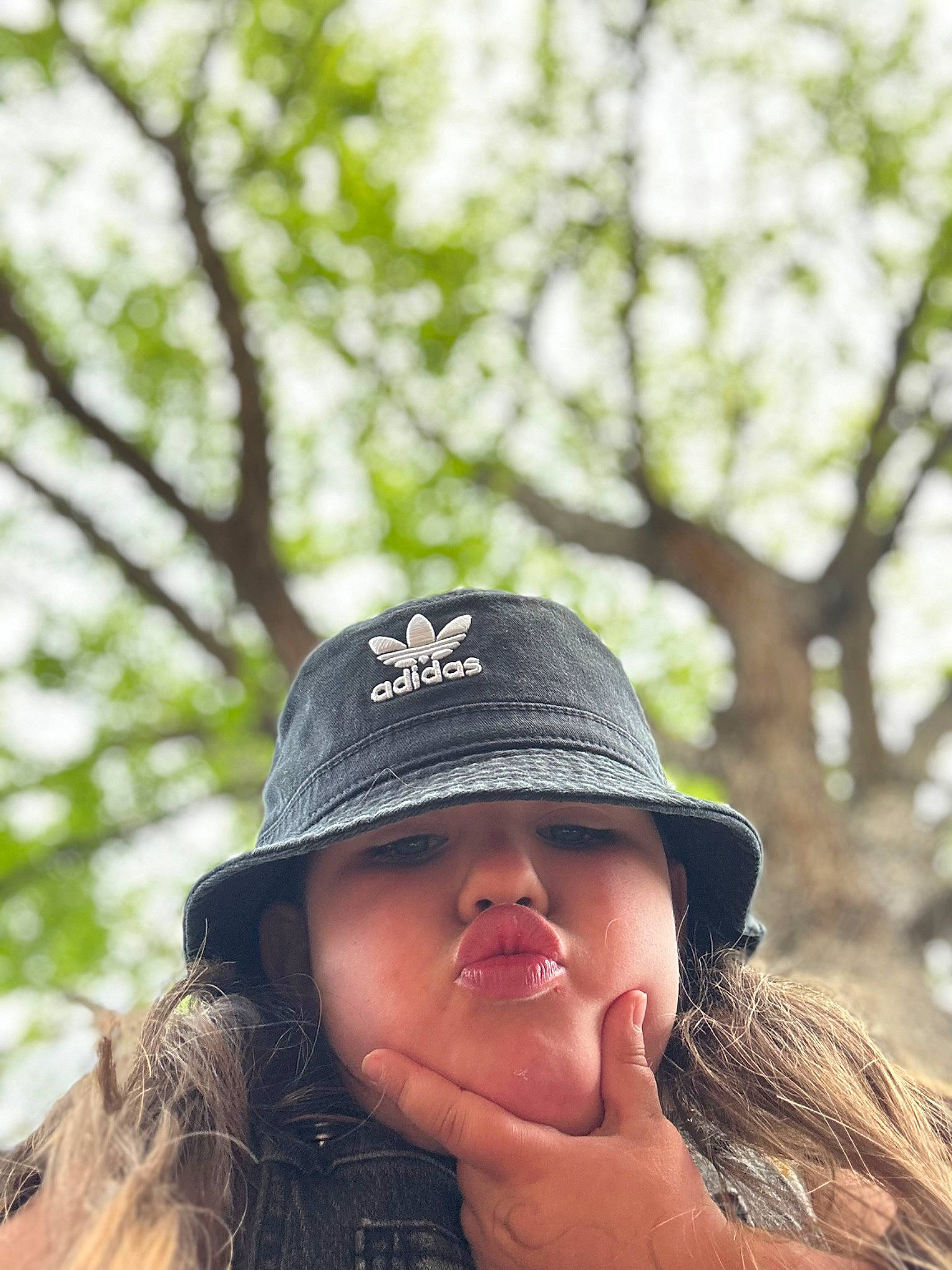 Eliza is registered to the contest to win money with this photo: brown_hair, cap, eyewear, fashion_accessory, feathered_hair, fedora, flash_photography, grass, hat, headgear, headwear, jewellery, lip, necklace, people_in_nature, person, plaid, plant, portrait_photography, sun_hat