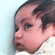Seerat Kaur is registered to the contest to win money with this photo: baby, blanket, child, close_up, closeup_photography, cute, eyes, face, hair, indoor, infant, mouth, nose, person, portrait, relaxed, side_profile, sleepy, soft_lighting, swaddled