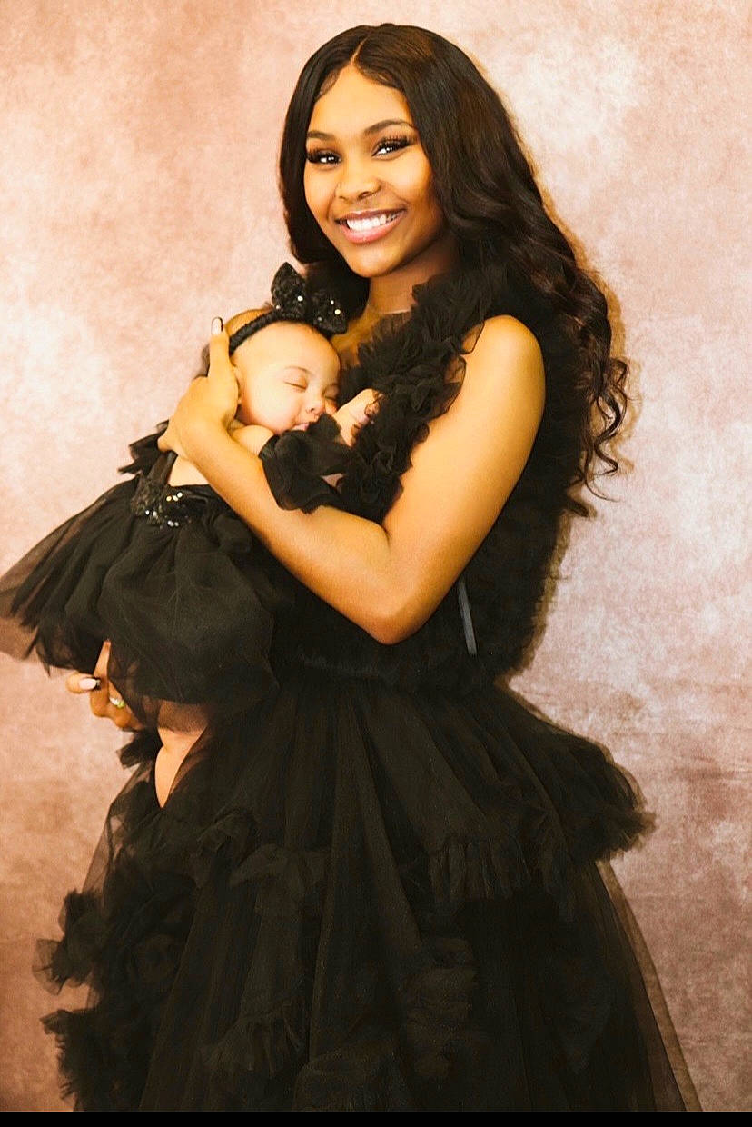 Kehlani is registered to the contest to win money with this photo: abdomen, black_hair, bridal_party_dress, brown_hair, day_dress, dress, fashion_design, fashion_model, flash_photography, formal_wear, gesture, gown, happy, joy, long_hair, one_piece_garment, person, skin, smile, thigh