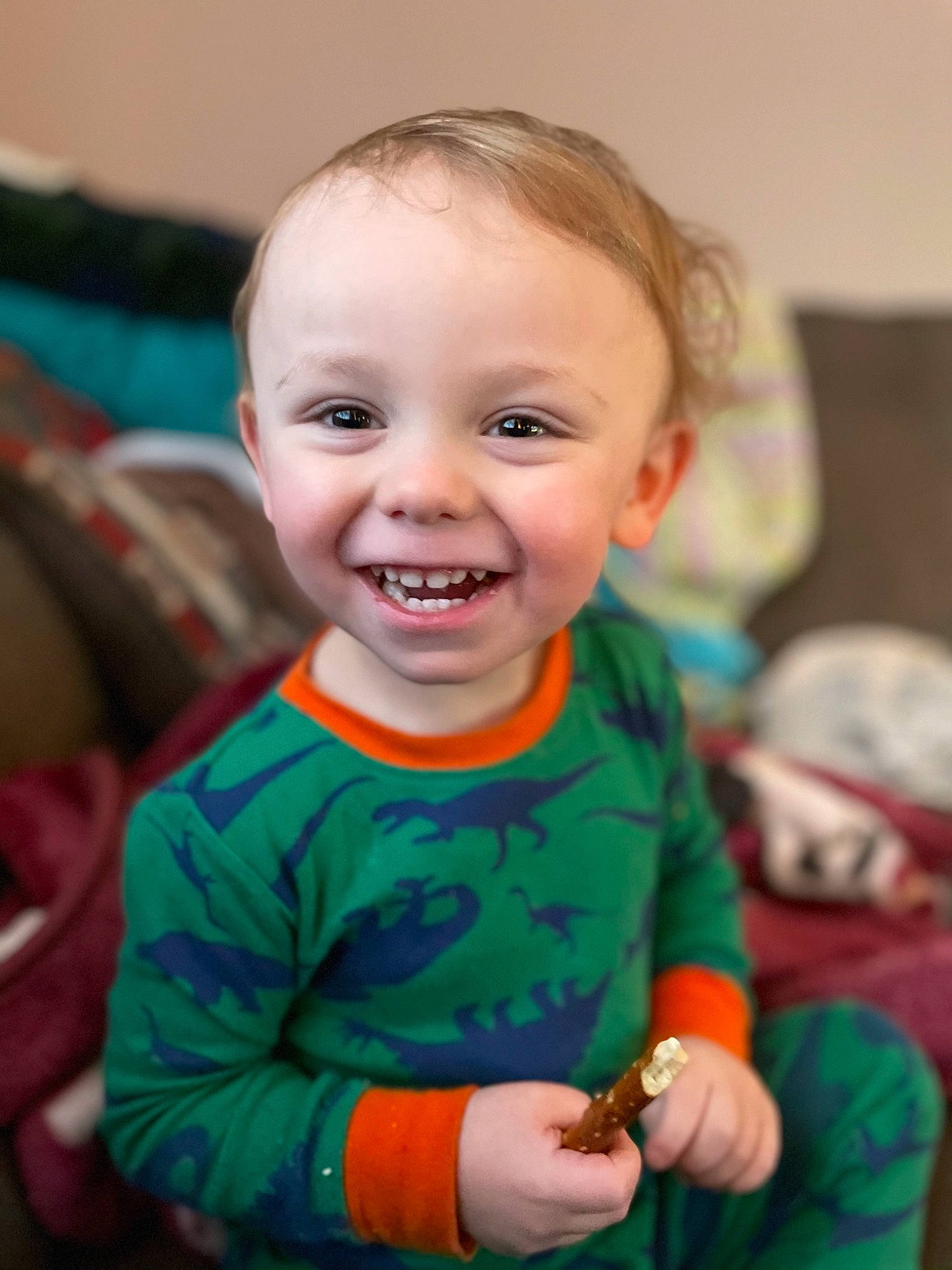 Holden is registered to the contest to win money with this photo: baby, baby_toddler_clothing, cheek, child, dress, event, eye, fun, happy, iris, joy, laugh, magenta, party, person, room, sitting, skin, sleeve, smile