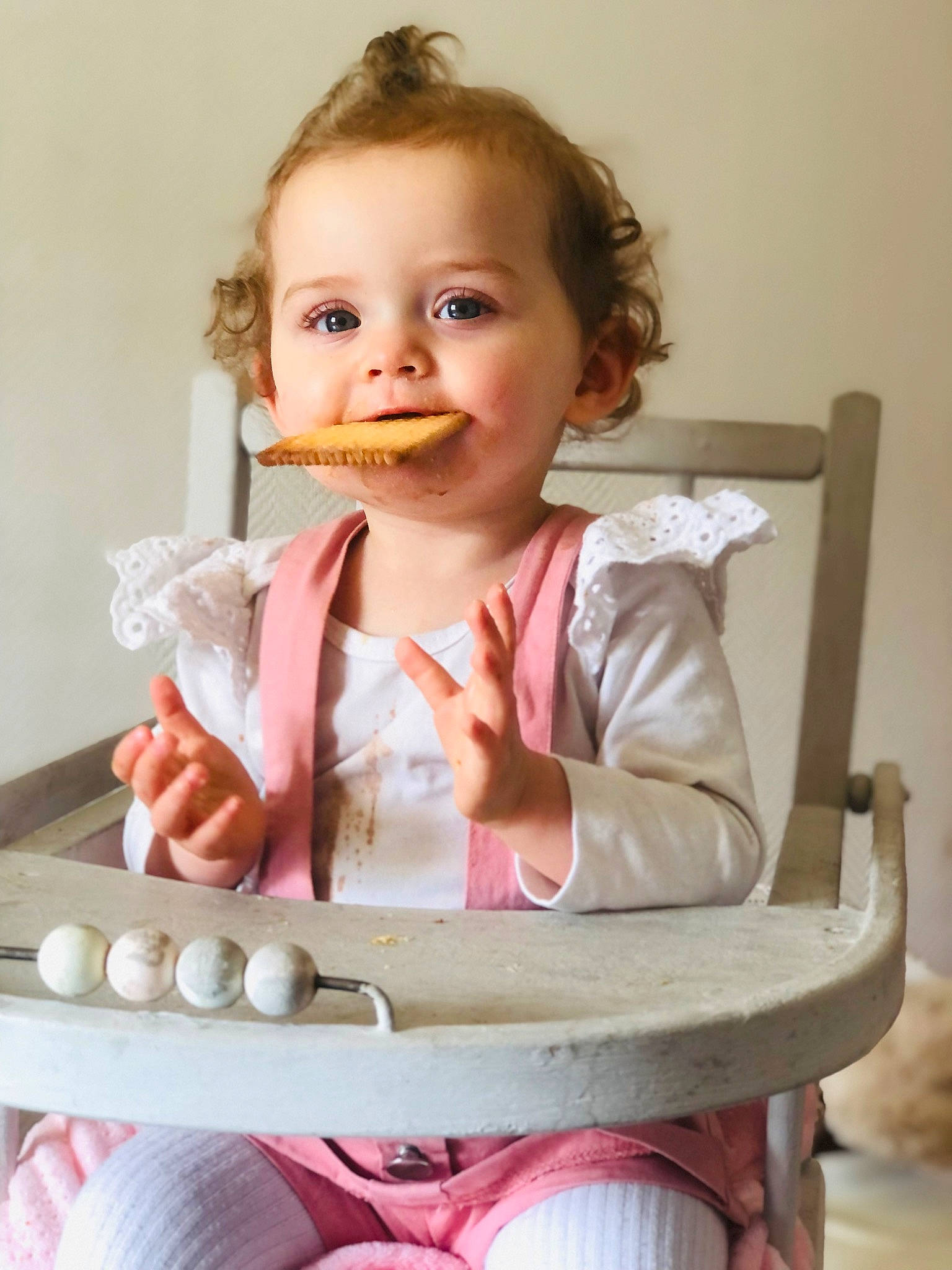 Ruby participe au concours pour gagner de l'argent avec cette photo : baby_toddler_clothing, chair, cheek, eye, eyebrow, hair, happy, head, iris, lip, mouth, neck, nose, person, pink, shoulder, skin, sleeve, smile, tableware