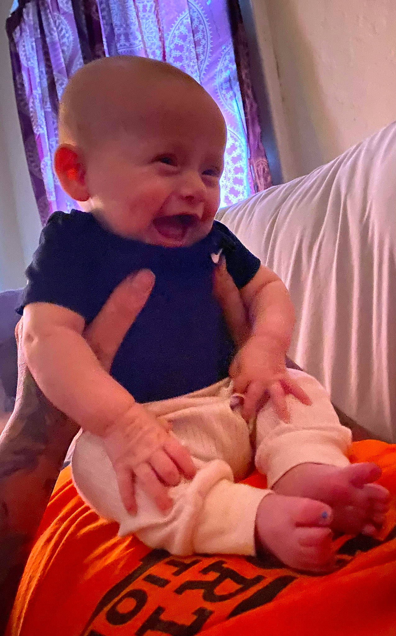 Annalise joined the competition — help win amazing prizes! arm, baby, baby_toddler_clothing, cheek, chin, comfort, facial_expression, finger, gesture, hand, human, human_body, leg, muscle, orange, person, pink, product, skin, sleeve