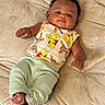 Dez joined the competition — help win amazing prizes! baby, infant, child, couch, clothing, tank_top, pants, footwear, smile, face, curly_hair, skin, relaxing, indoors, soft_texture, winnie_the_pooh, tigger, cute, lying_down, comfort