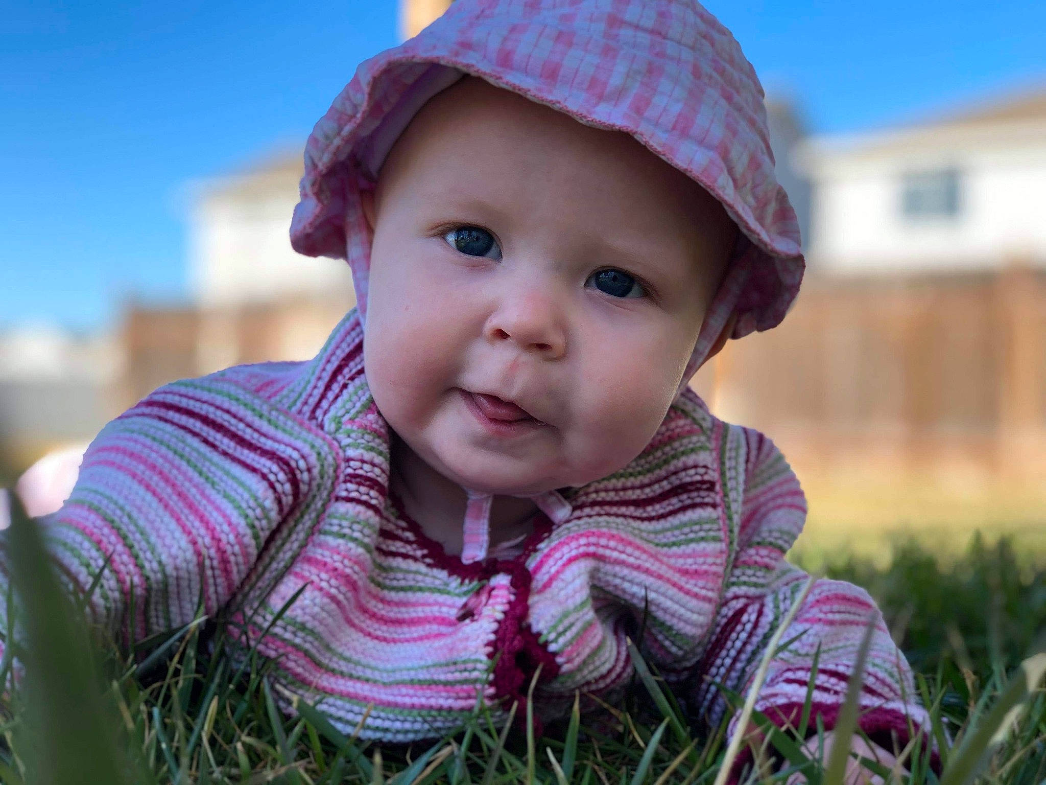 Pheonix joined the competition — help win amazing prizes! baby, bonnet, cap, cheek, child, child_model, face, fun, grass, happy, hat, head, headgear, headwear, outerwear, person, pink, play, skin, smile