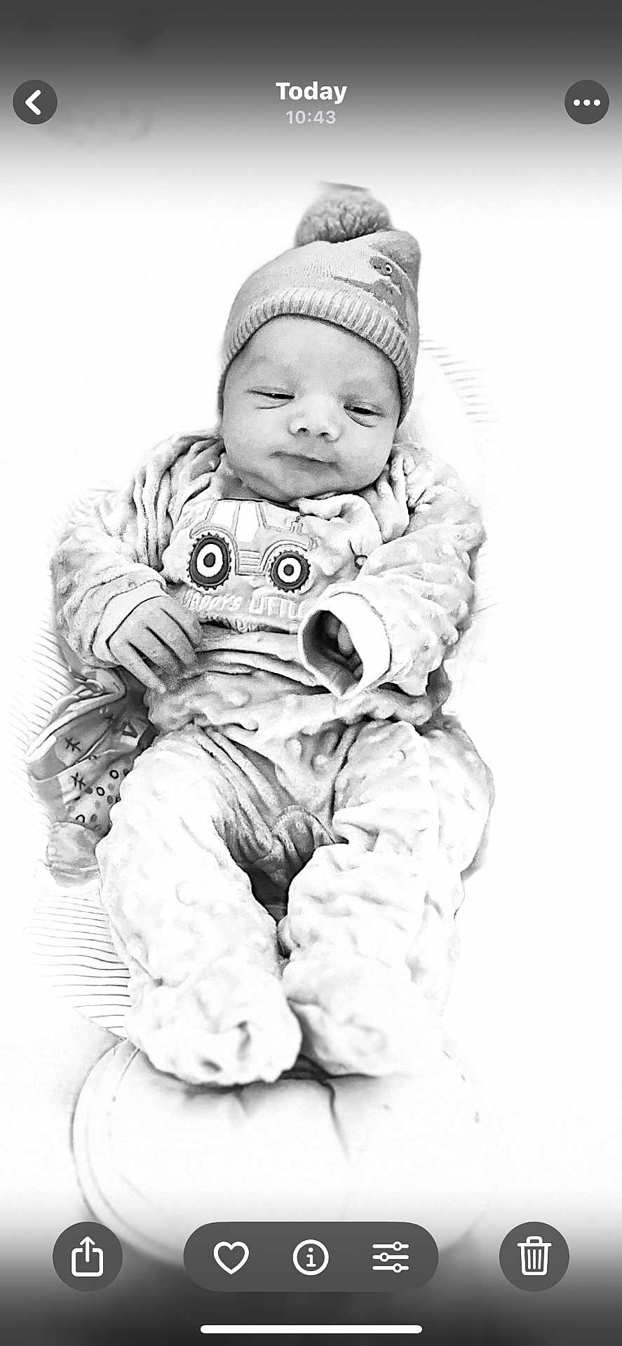 Jesus joined the competition — help win amazing prizes! baby, infant, hat, knit_hat, clothing, onesie, sleepwear, blanket, soft_texture, cute, newborn, lying_down, peaceful, portrait, monochrome, black_and_white, small_hands, footed_pajamas, sleeping_baby, indoor