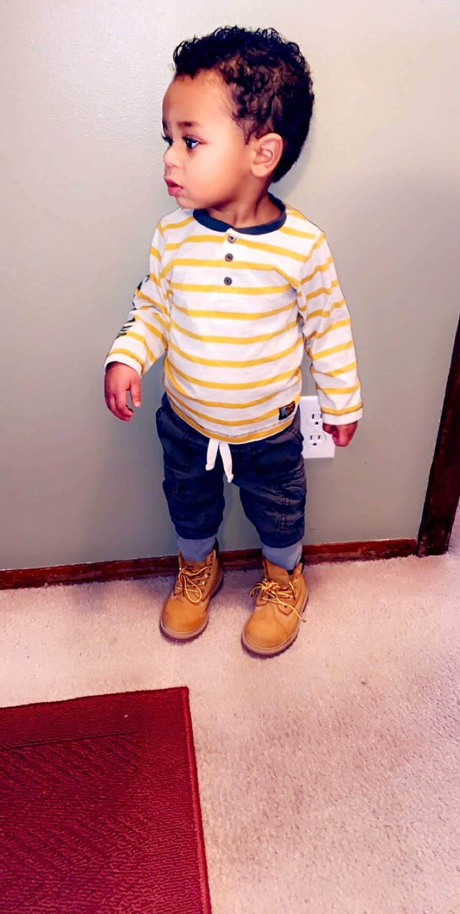 Javen joined the competition — help win amazing prizes! baby, baby_toddler_clothing, child, clothing, jeans, male, outerwear, person, shoe, sleeve, standing, t_shirt, toddler, trousers, yellow