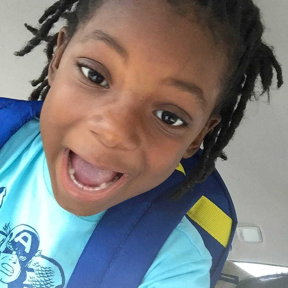 Javon is registered to the contest to win money with this photo: beauty, black_hair, child, chin, cool, cornrows, dreadlocks, eyebrow, face, facial_expression, forehead, hair, hairstyle, happy, head, jaw, joy, long_hair, nose, person