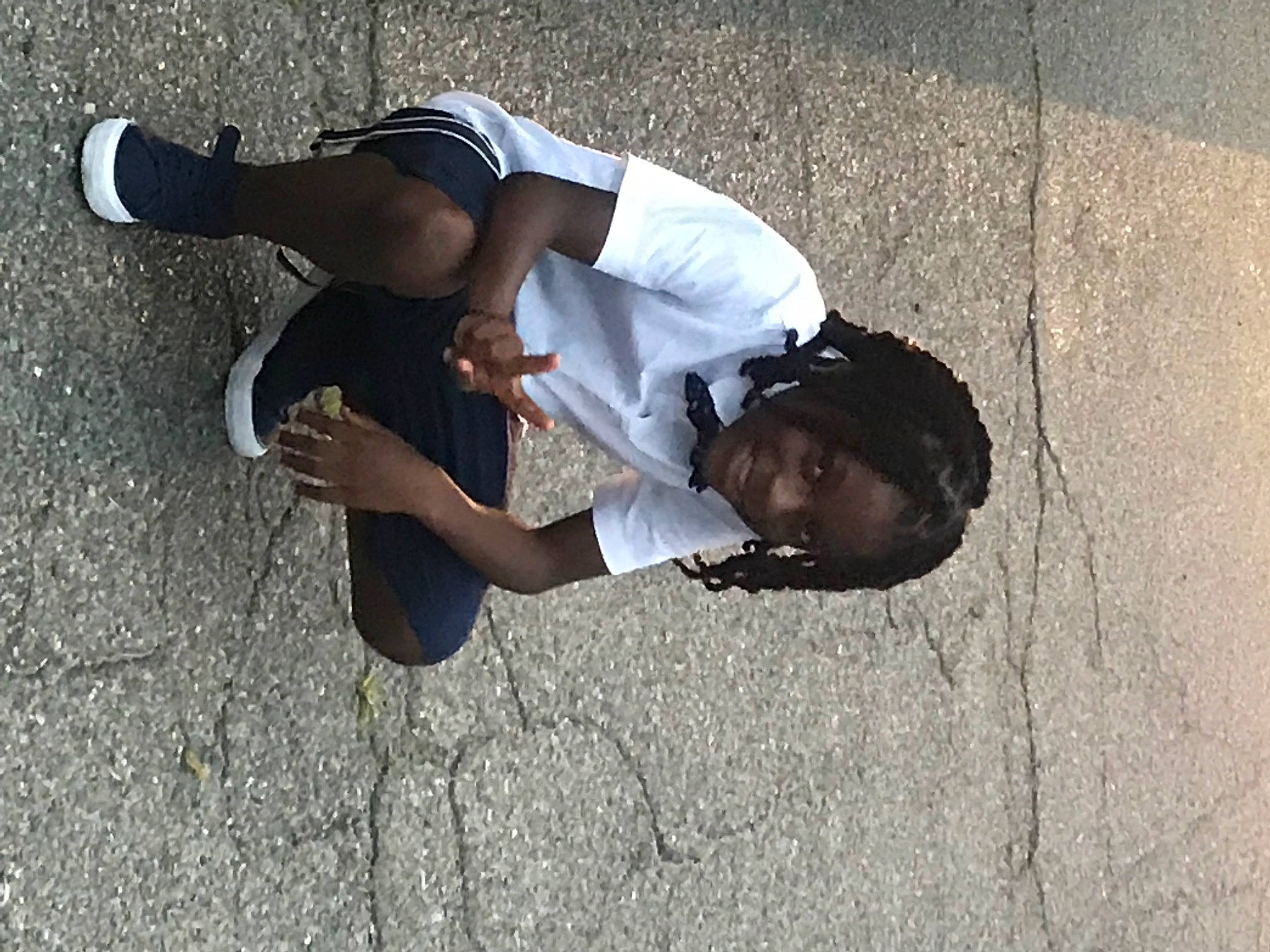 Javon is registered to the contest to win money with this photo: child, footwear, joy, person, photography, road, street