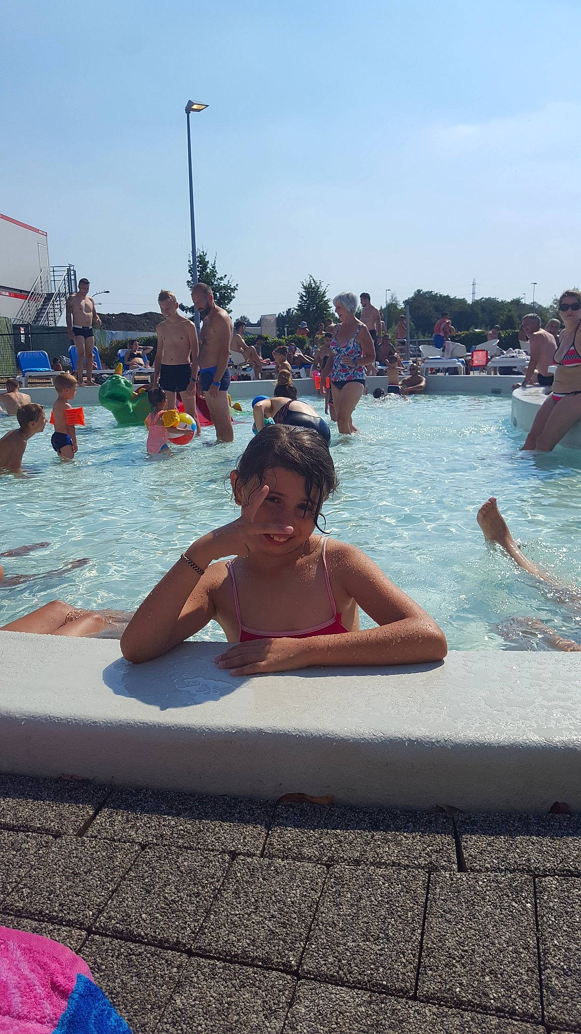 Celia participe au concours pour gagner de l'argent avec cette photo : beach, body_of_water, coastal_and_oceanic_landforms, fun, girl, joy, leisure, person, recreation, sea, summer, sun_tanning, swimming, swimming_pool, swimwear, tourism, vacation, water